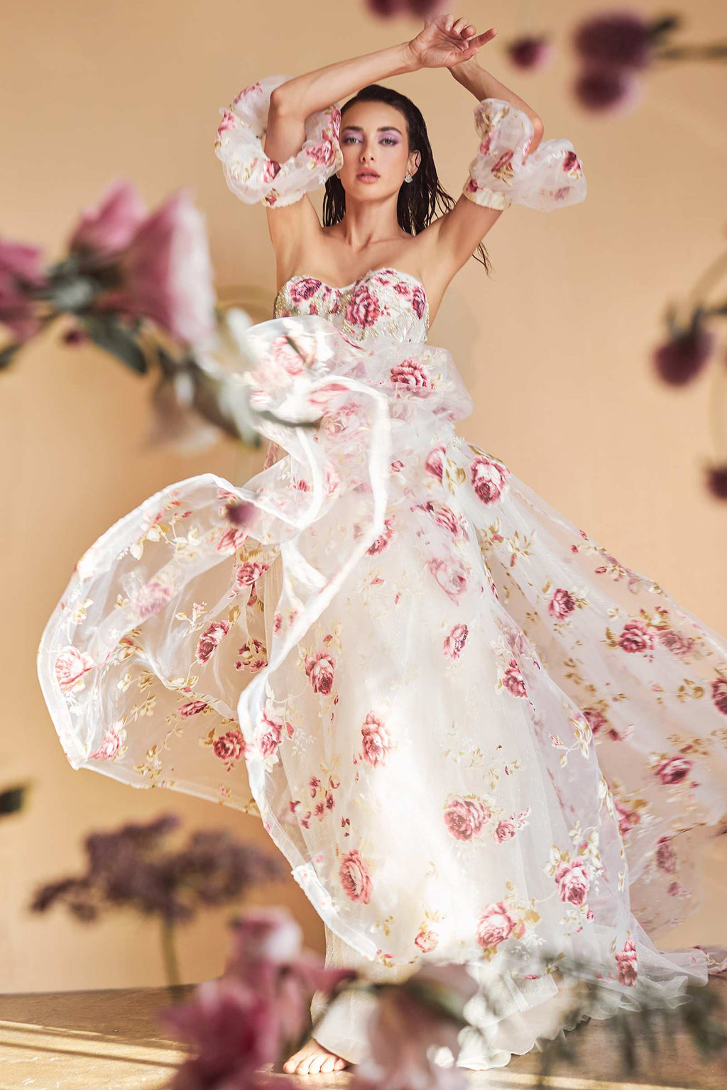 Strapless organza ball gown with pink peony floral print, sheer puff sleeves and full tulle skirt