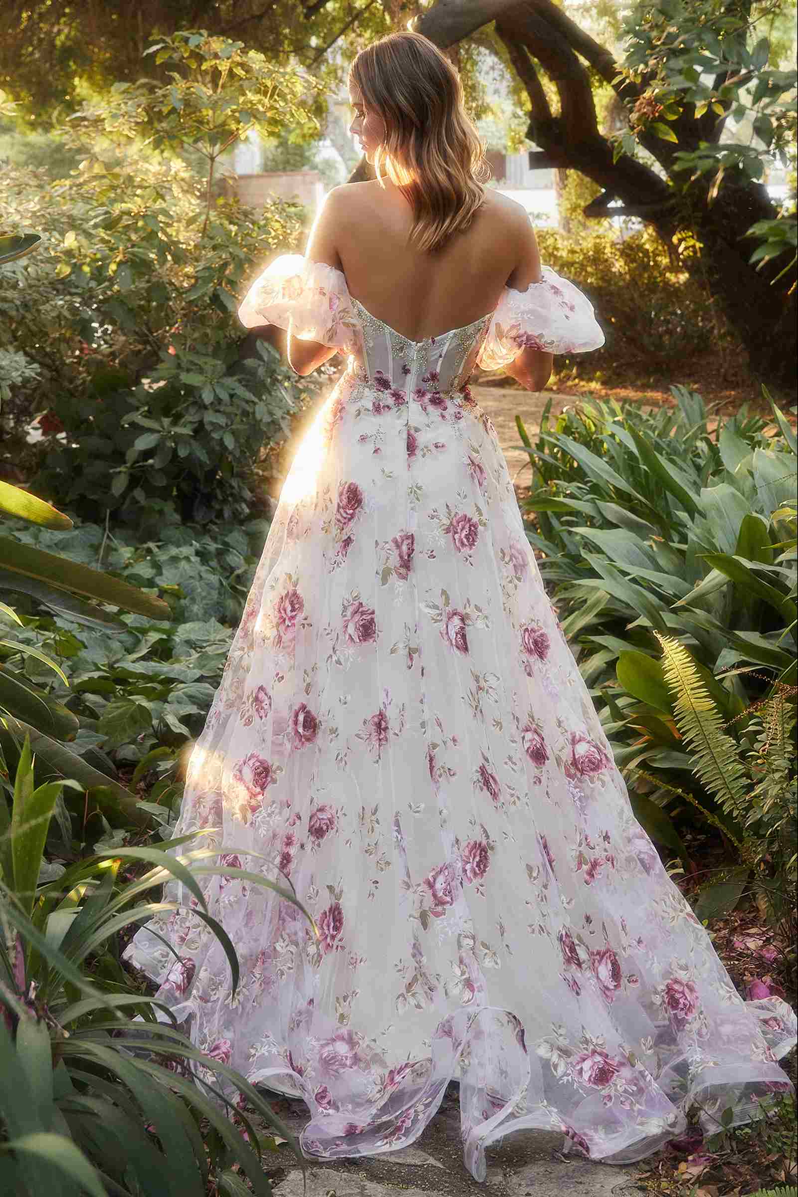 Back view strapless organza ball gown with pink and purple peony floral print, full skirt