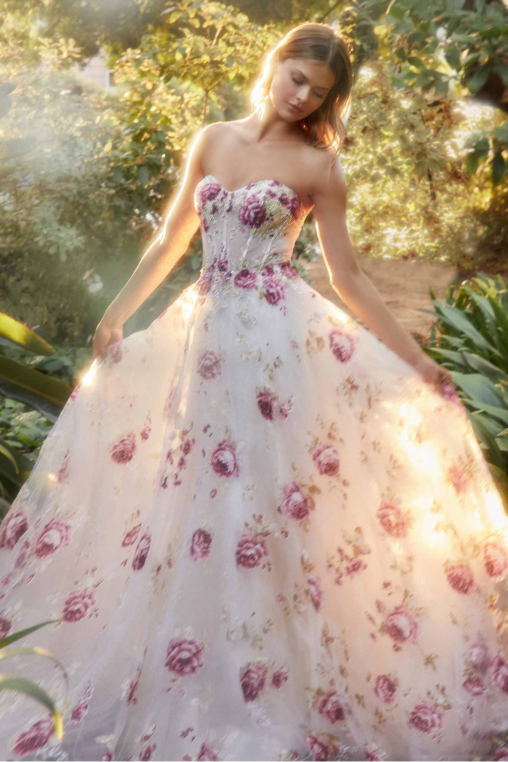 Strapless organza ball gown with peony floral print and ruffled bodice, flowing skirt