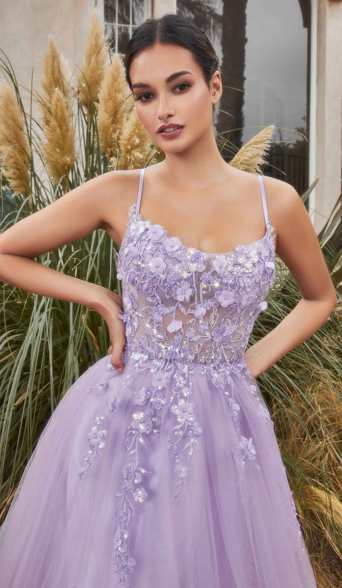 Lavender floral applique tulle gown with spaghetti straps and embellished bodice.