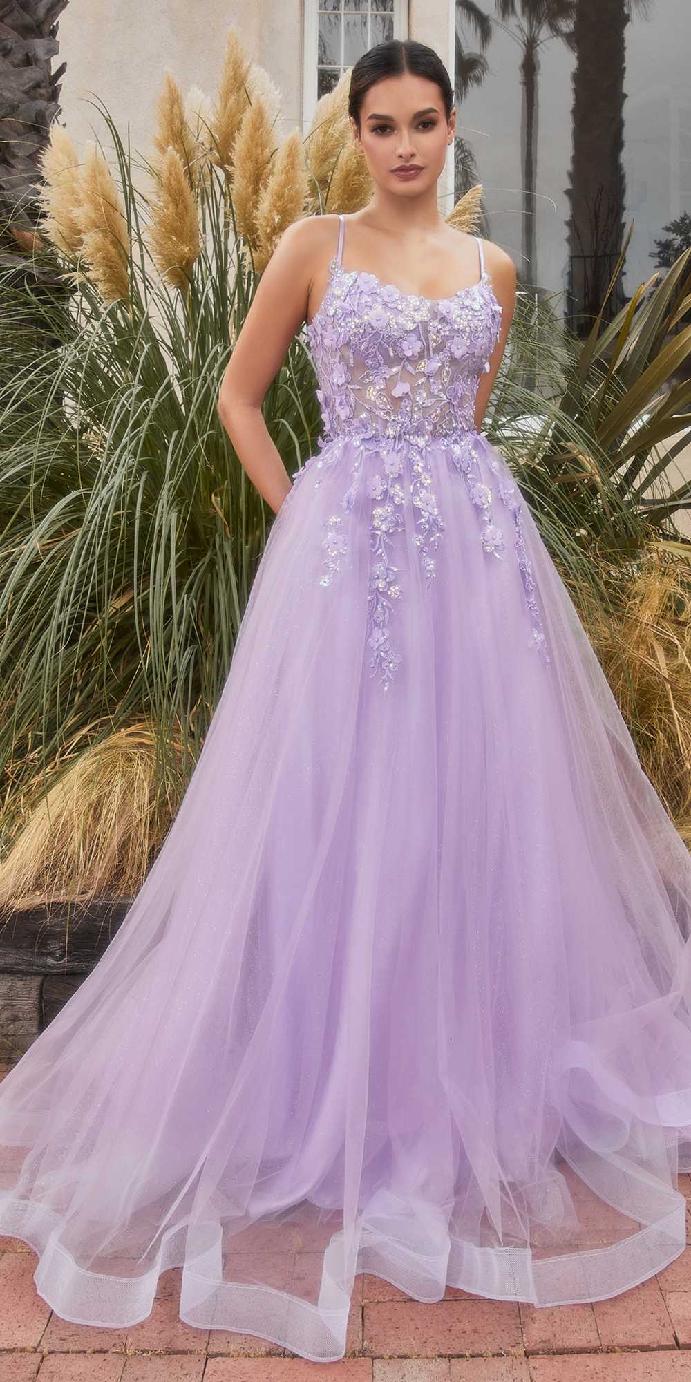 Lavender floral applique tulle A-line gown with thin straps and full tulle skirt.