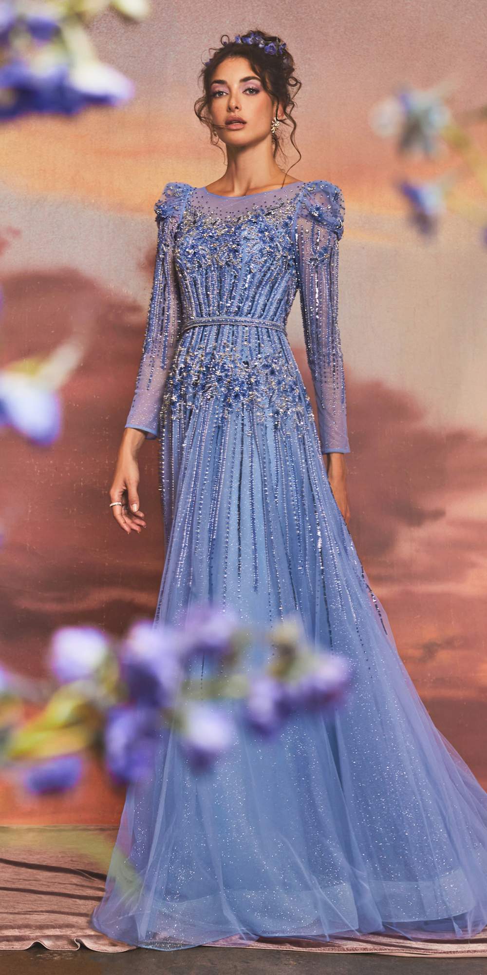 Blue beaded A-line gown with long sleeves and off-shoulder neckline, floor length