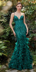 Emerald green mermaid gown with sequin sparkle and feathered hem, spaghetti straps