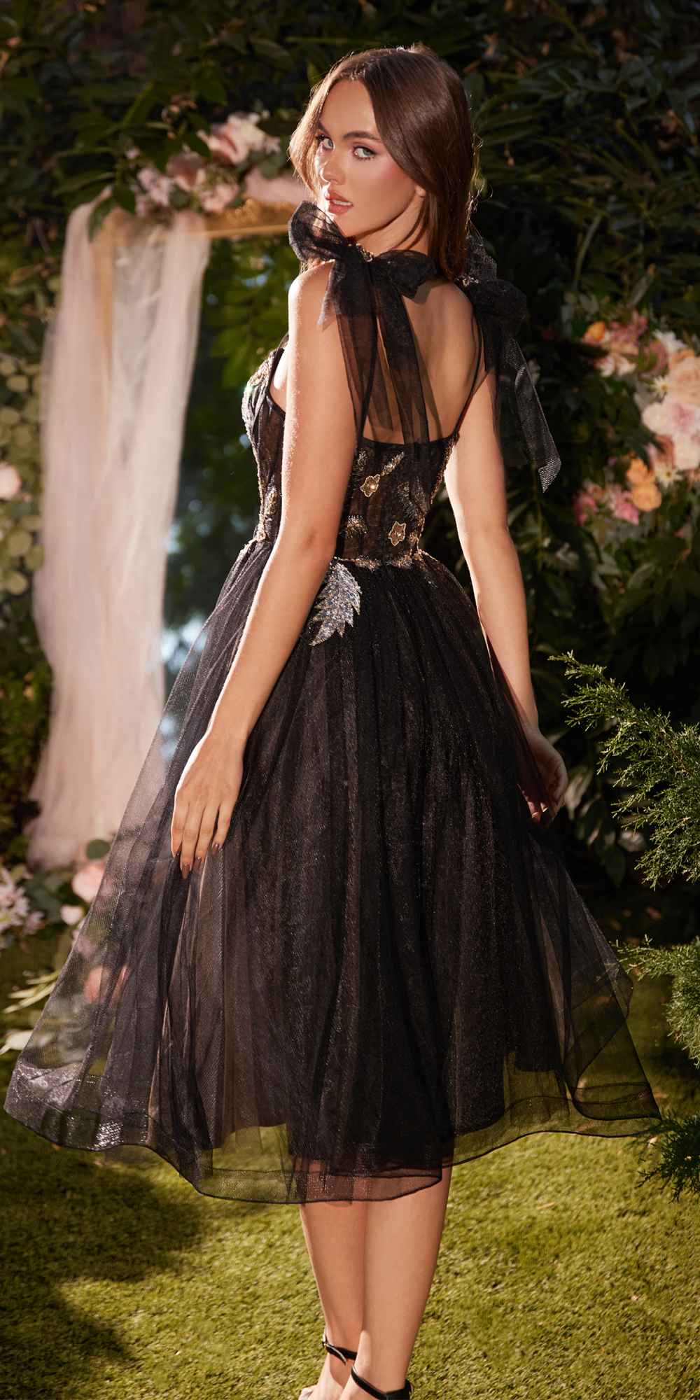 Black tea-length A-line tulle dress with lace bodice and spaghetti straps