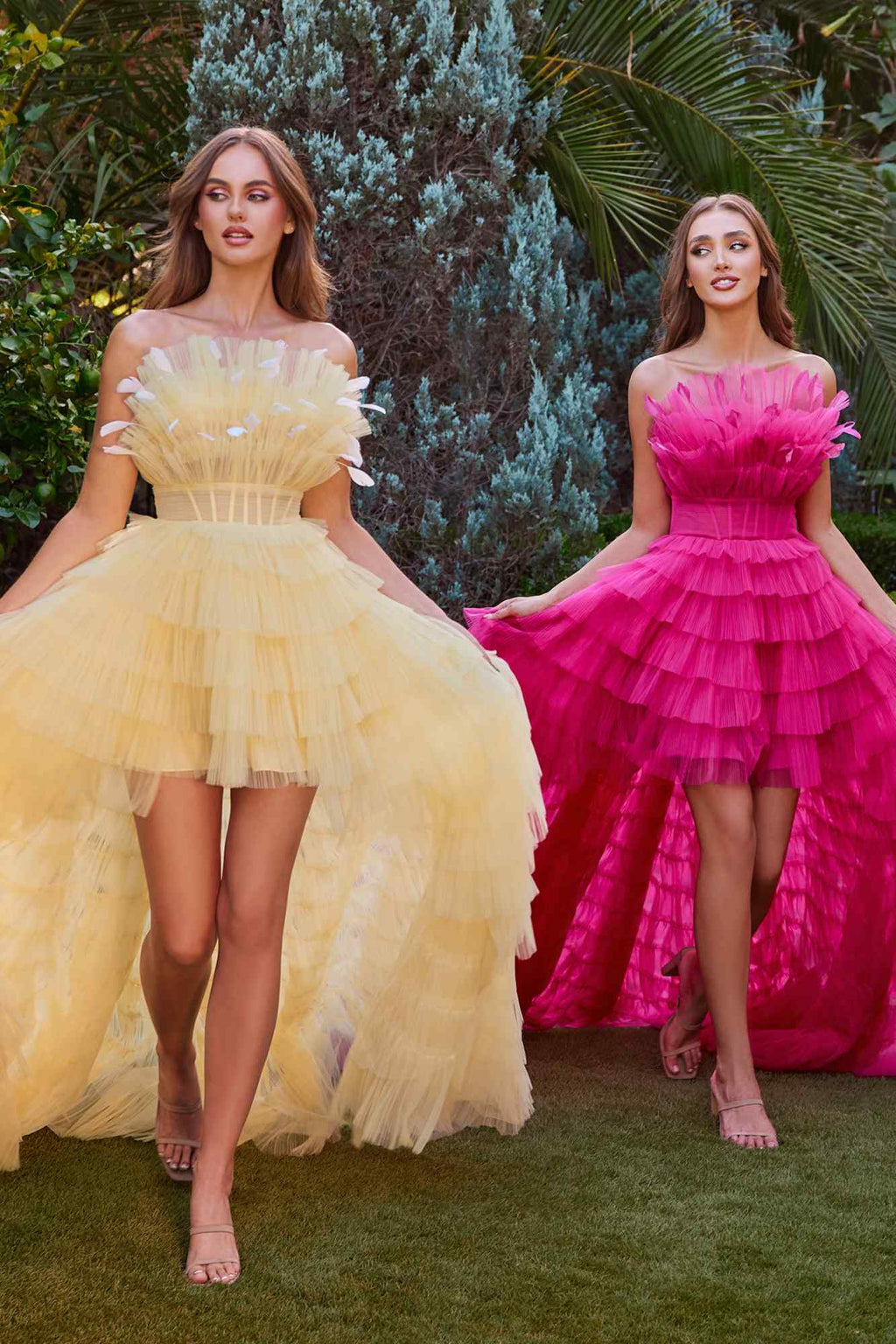 Two tiered tulle high-low gowns in pale yellow and fuchsia, ruffled skirt