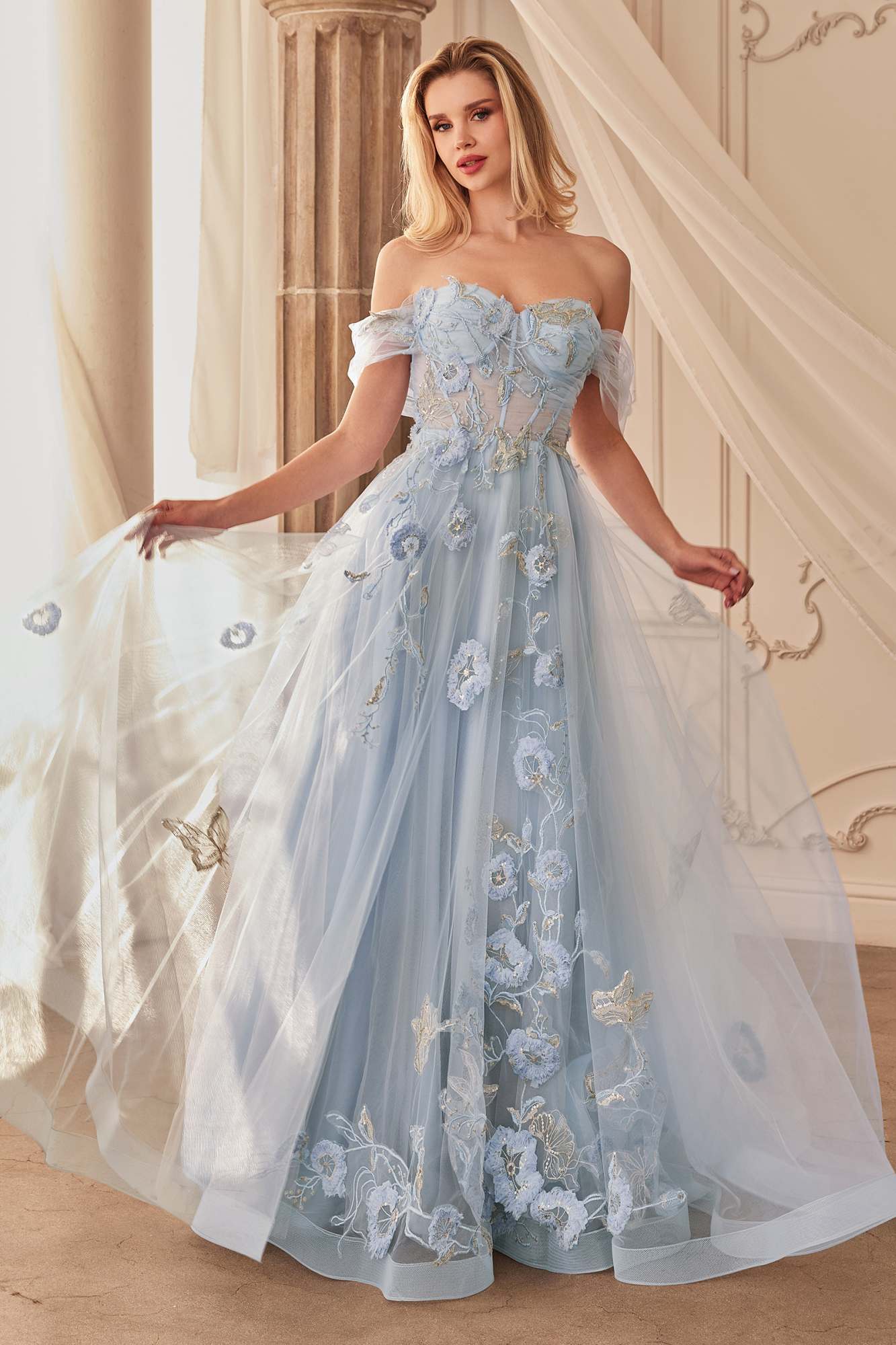Dusty blue off-shoulder tulle ball gown with floral appliques and airy floor-length skirt