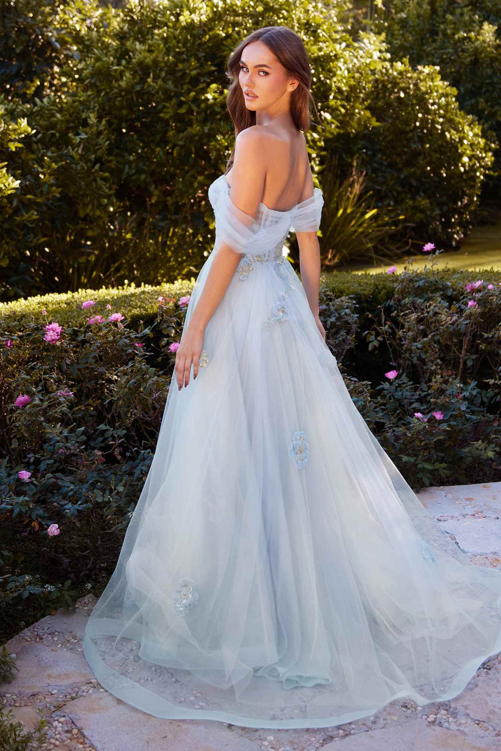 Dusty blue off-shoulder tulle ball gown with floral applique and flowing A-line skirt