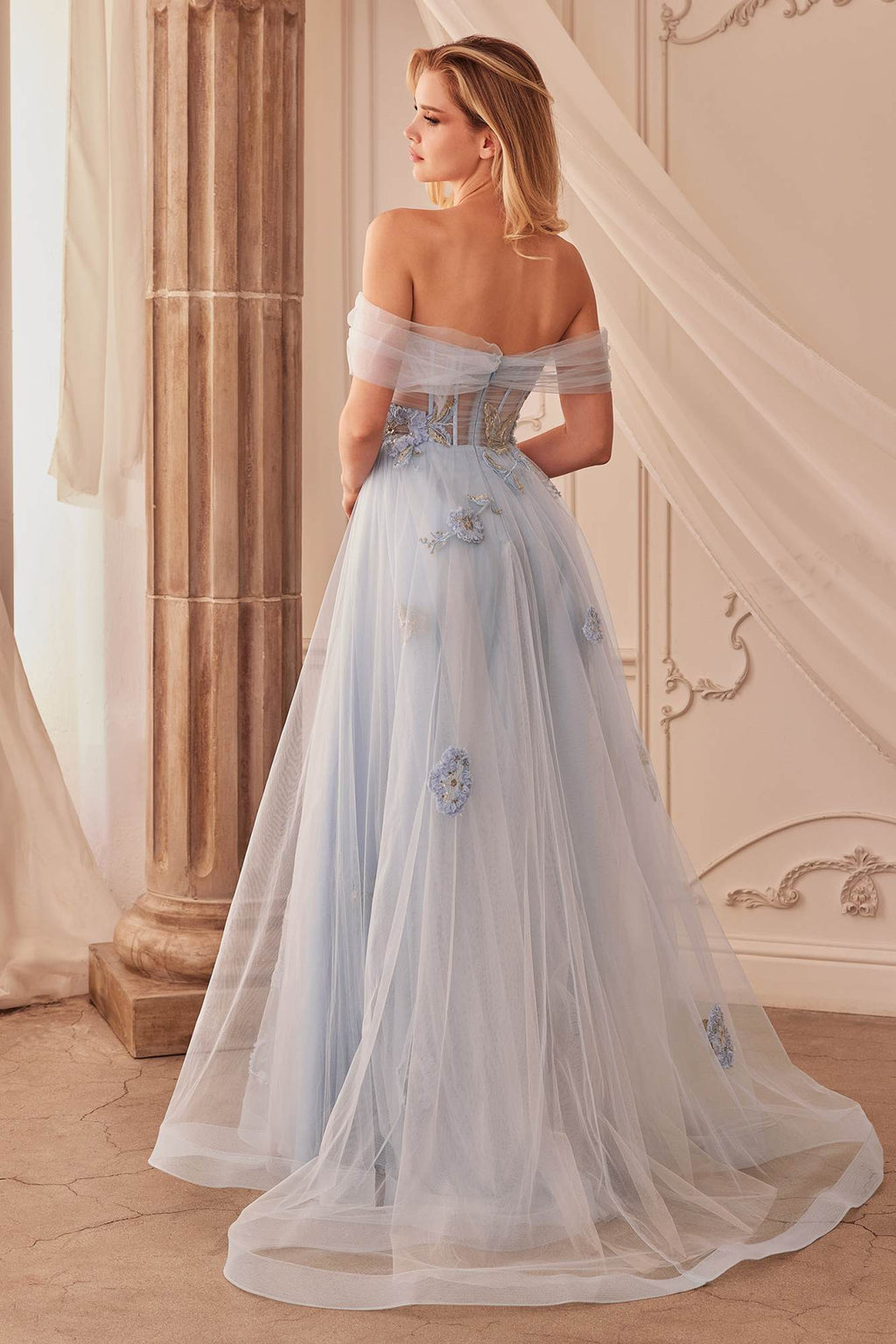 Dusty blue off-shoulder tulle ball gown with floral applique and open-back detail