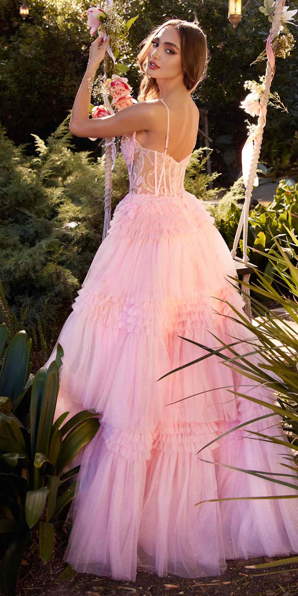 Blush pink princess ball gown with sweetheart corset bodice and tiered tulle skirt