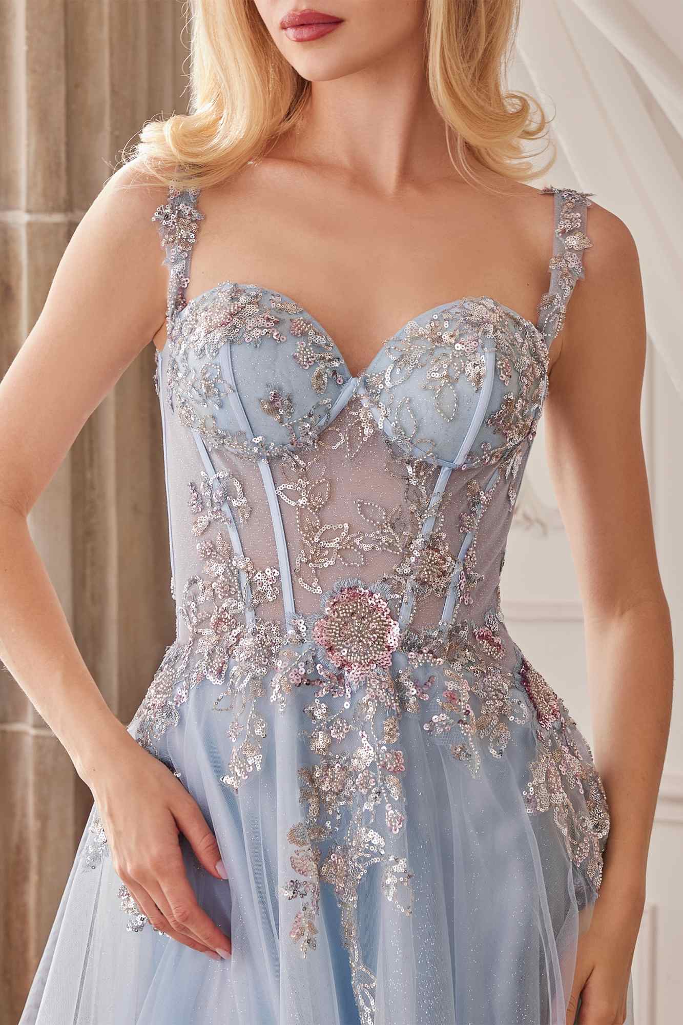 Dusty blue corset bodice with beaded floral appliques and lace straps, A-line tulle