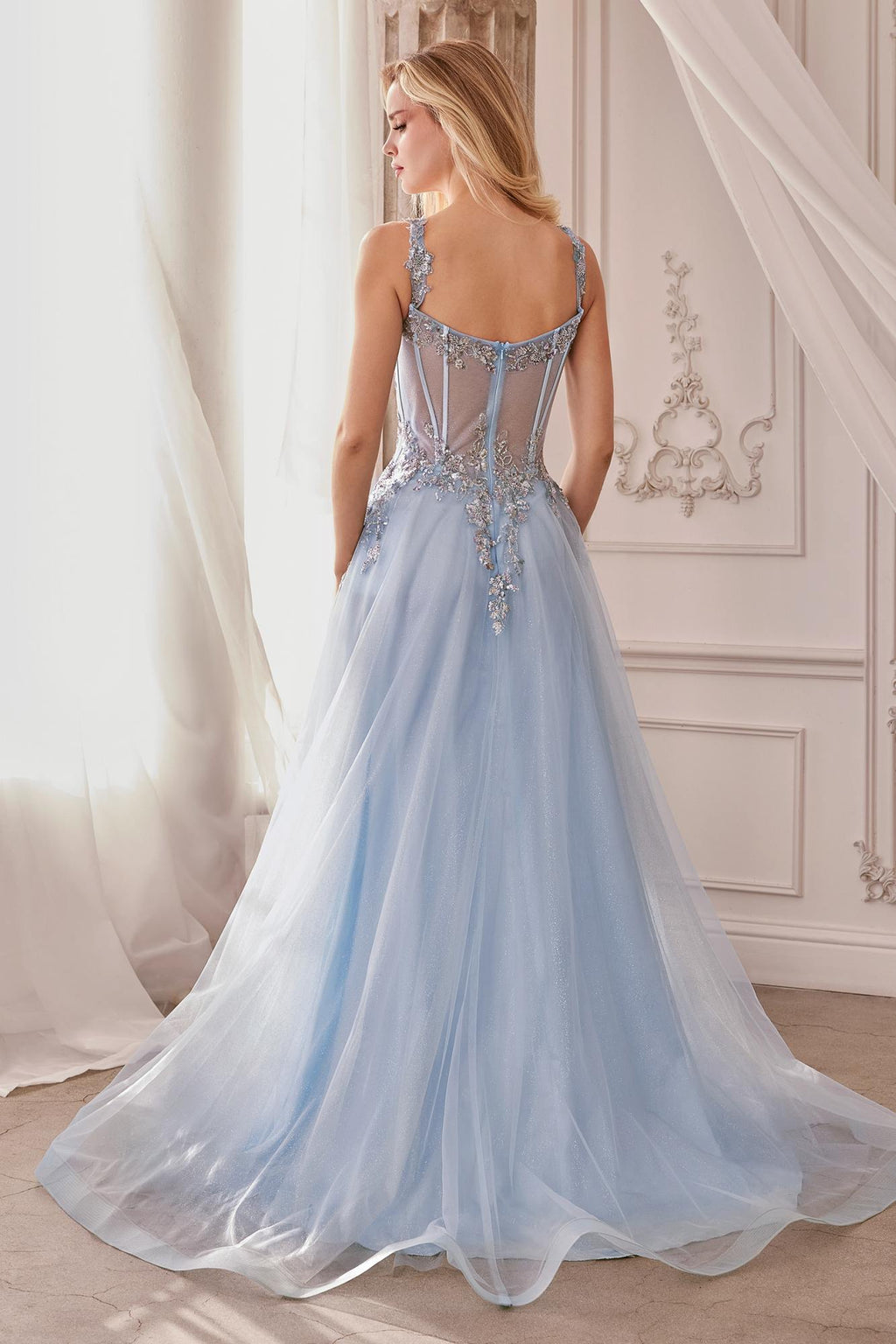 Dusty blue A-line ball gown back view with lace straps and embellished tulle skirt