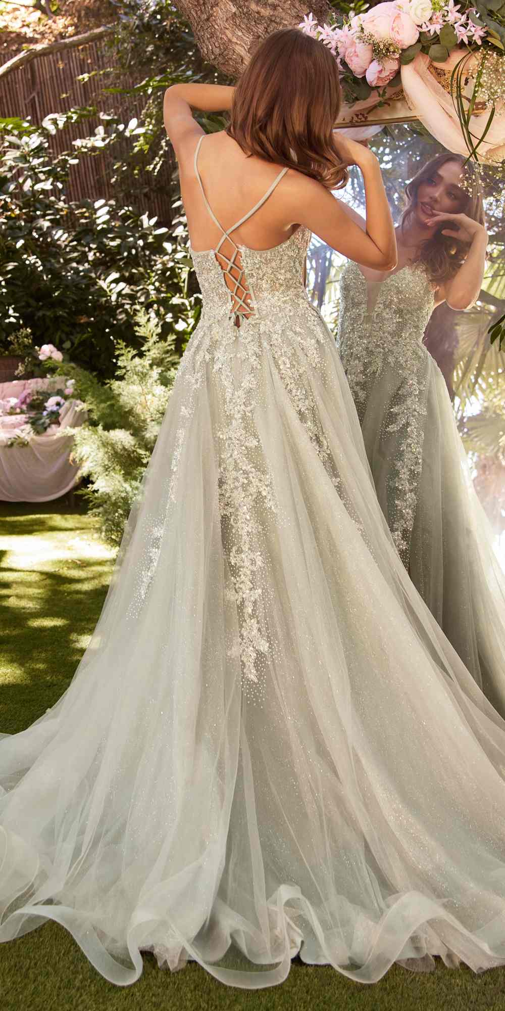 Sparkly lace tulle A-line gown back view with spaghetti straps and layered train