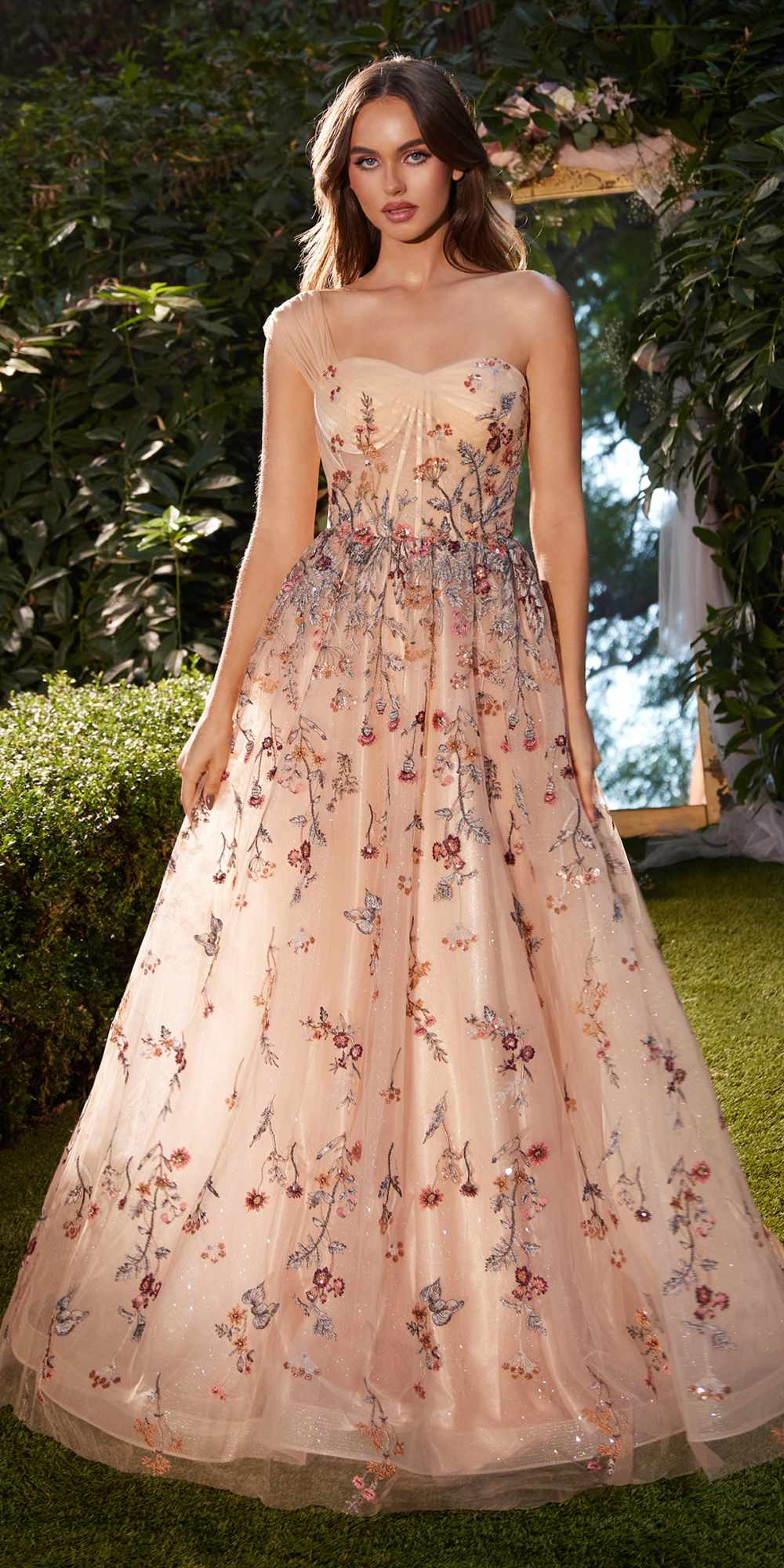 Champagne one-shoulder embroidered A-line gown with floral pattern, long length.