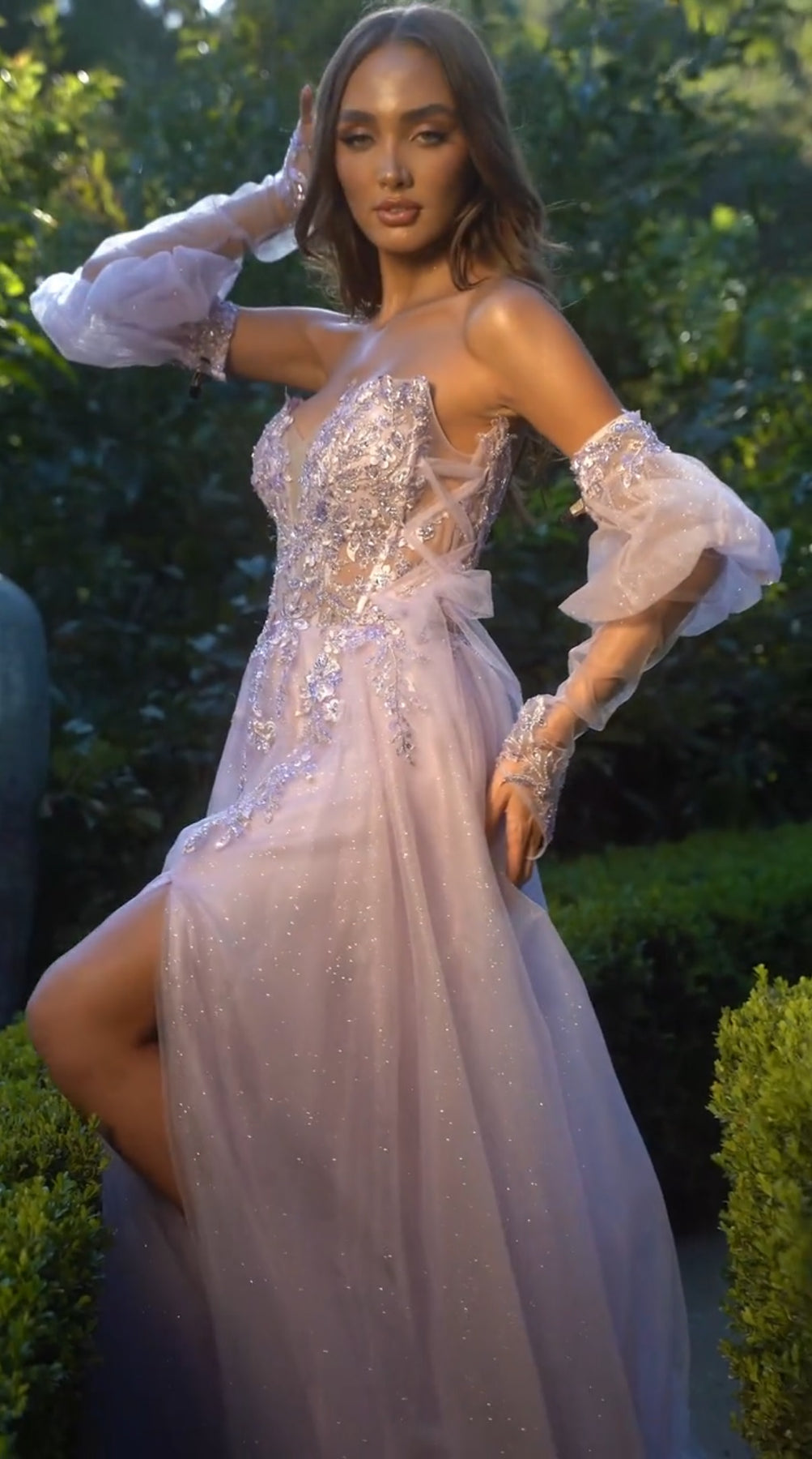 Haze blue strapless glitter tulle A-line gown with floral beading and sheer sleeves
