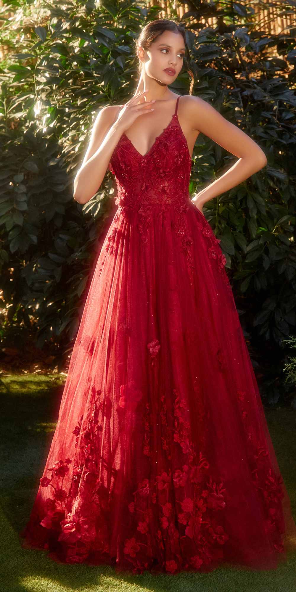 Crimson red A-line tulle gown with V-neck spaghetti straps and floral textured appliques
