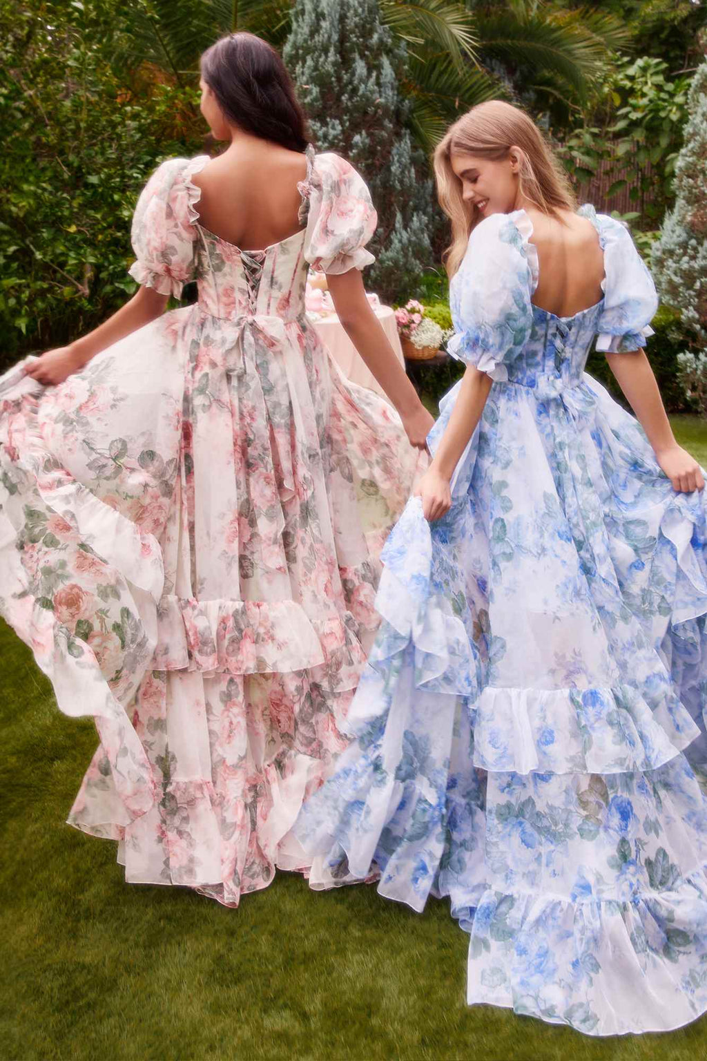 Floral A-line gown back view with puff sleeves and layered ruffled skirt
