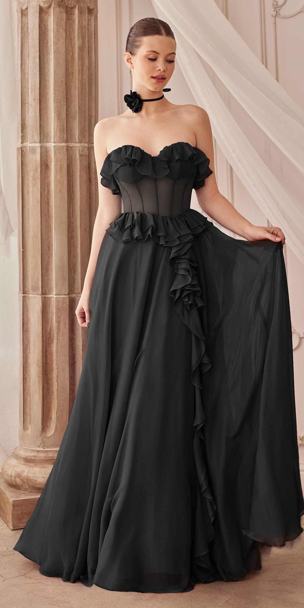 Black long strapless chiffon dress with ruffled bodice and cascading ruffle skirt