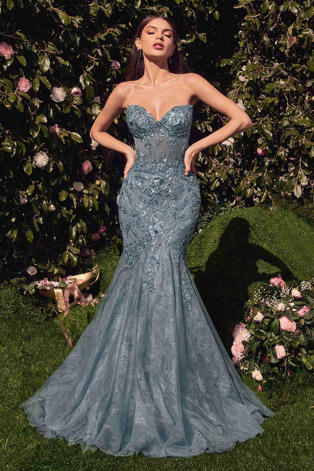 Blue strapless lace mermaid gown with beaded bodice and long tapered skirt