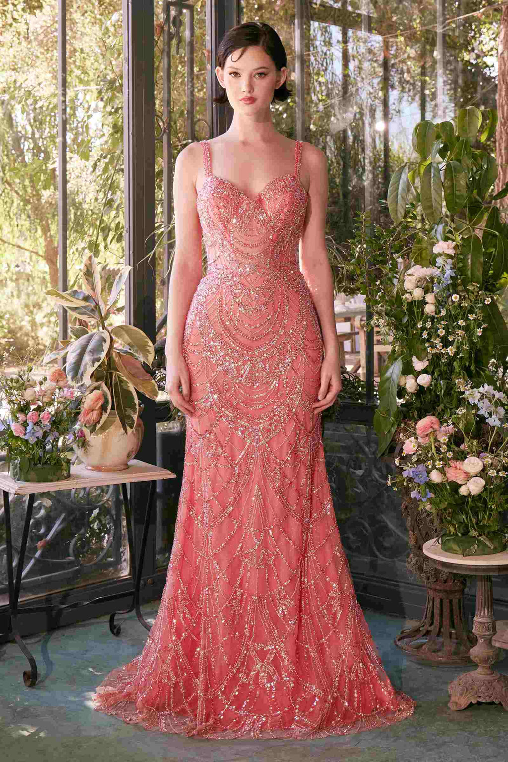 Rose-pink fitted beaded evening gown with thin straps and scalloped sparkle texture