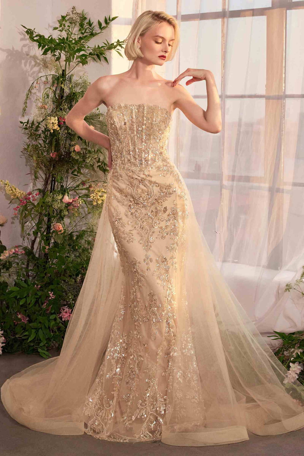 Champagne strapless sequin gown with layered tulle overskirt