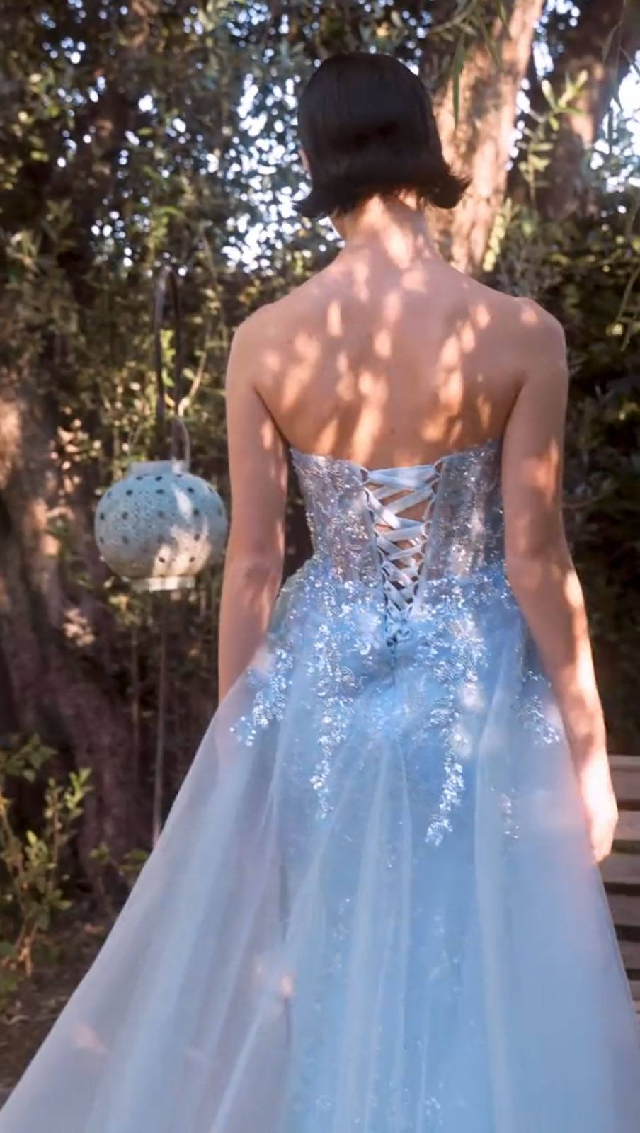 Light blue strapless sequin backless gown with full tulle skirt
