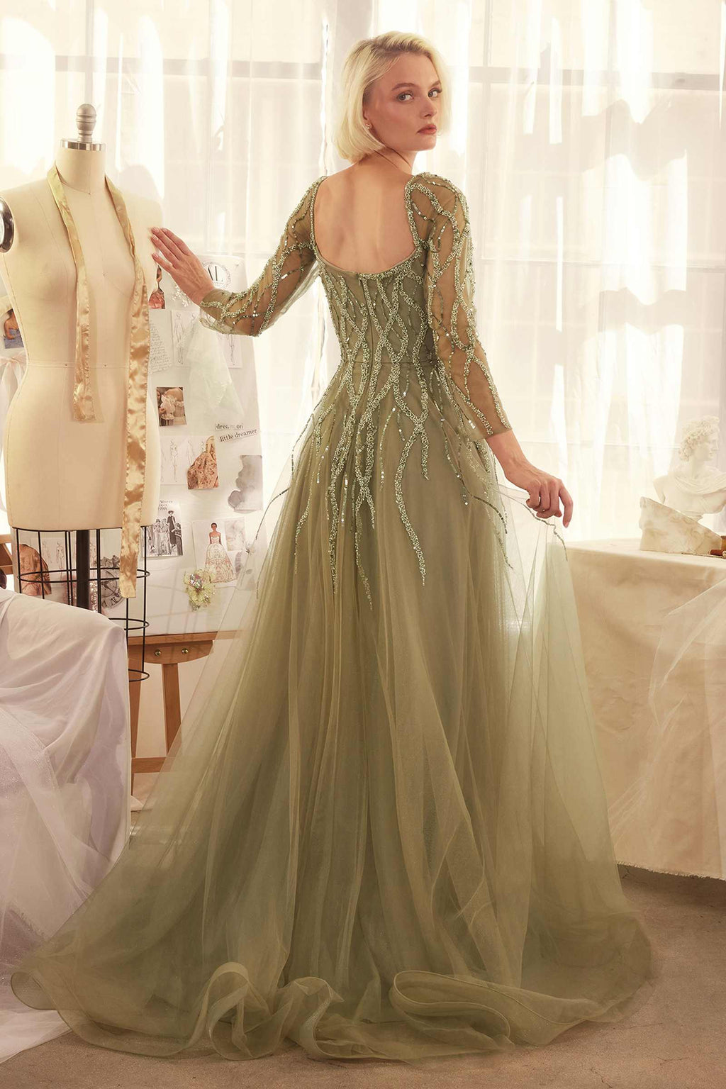 Olive sequin long-sleeve A-line evening gown with square neckline and flowing skirt