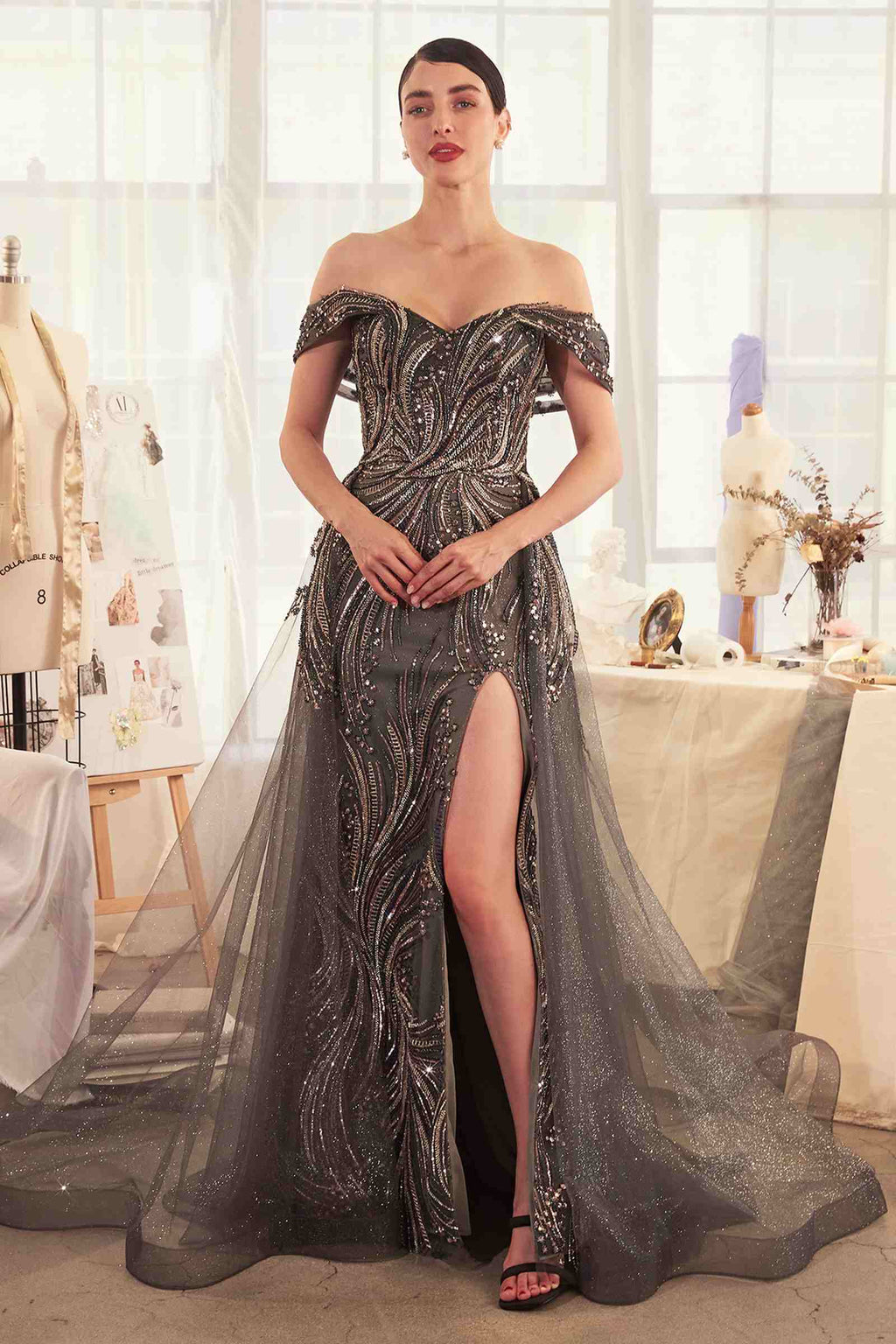 Dark silver off-shoulder beaded gown with flowing overskirt and front slit