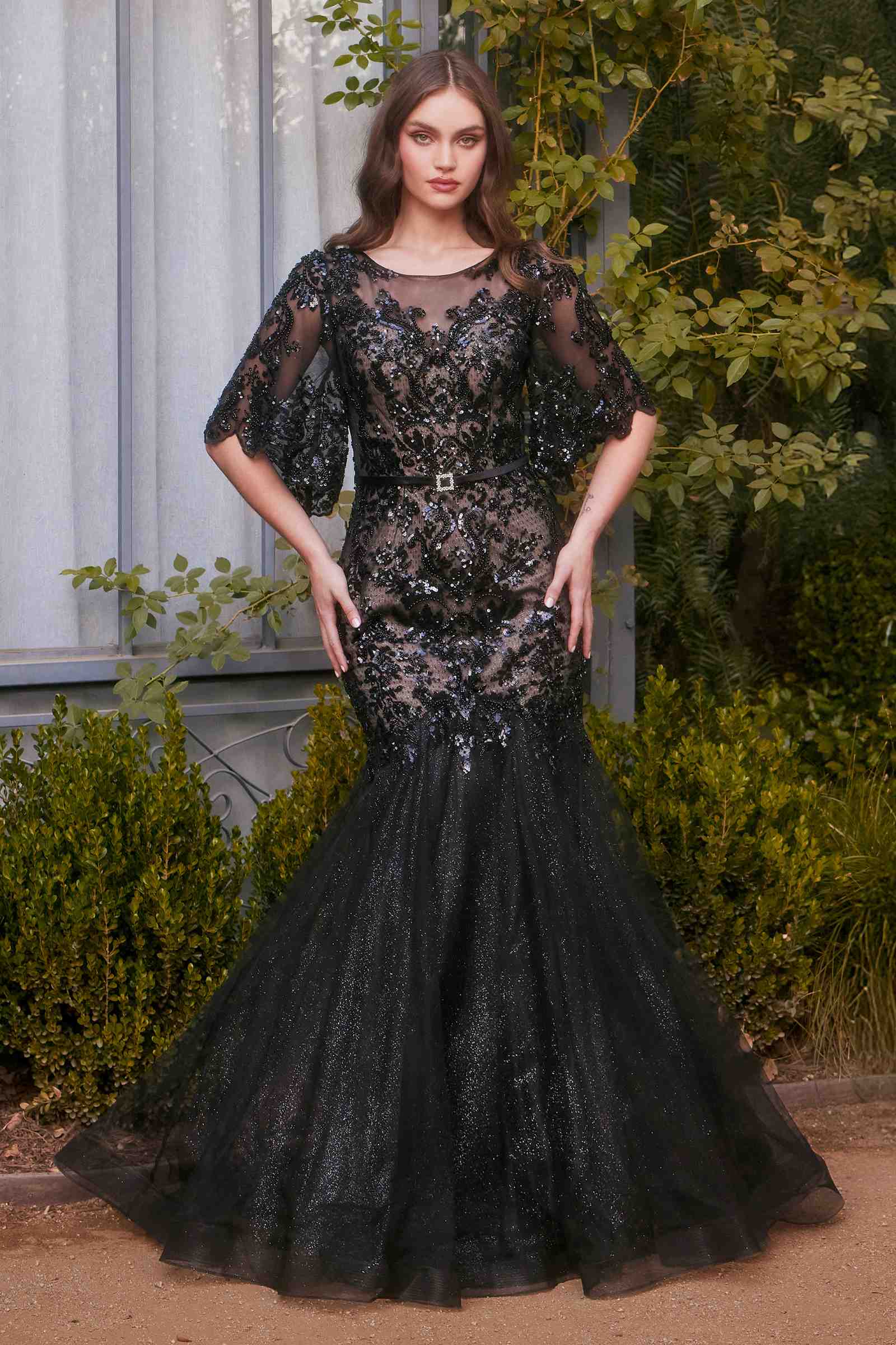 Black sequin mermaid gown with floral motif, sheer sleeves and fitted bodice