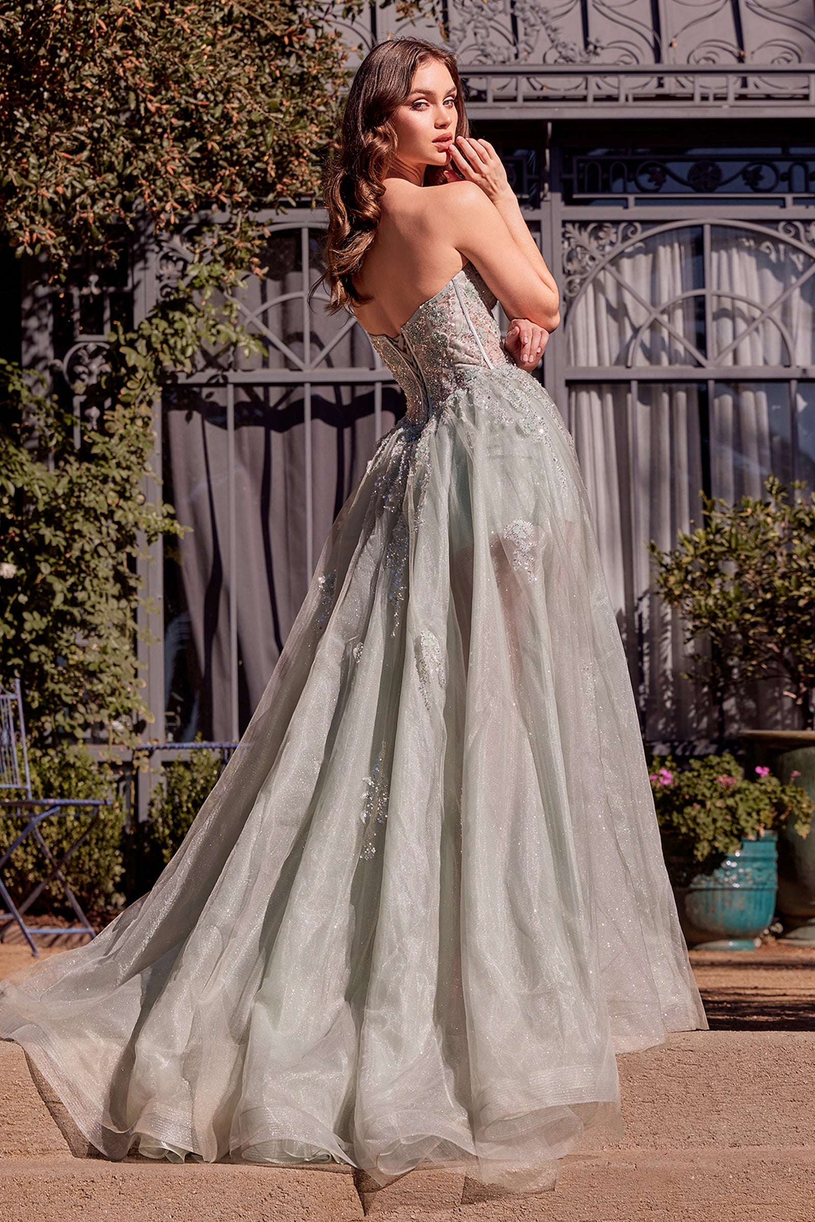 Gray tulle A-line gown with sweetheart bodice and daisy applique detailing