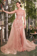 Blush tulle gown with lace bodice, open back, and layered skirt