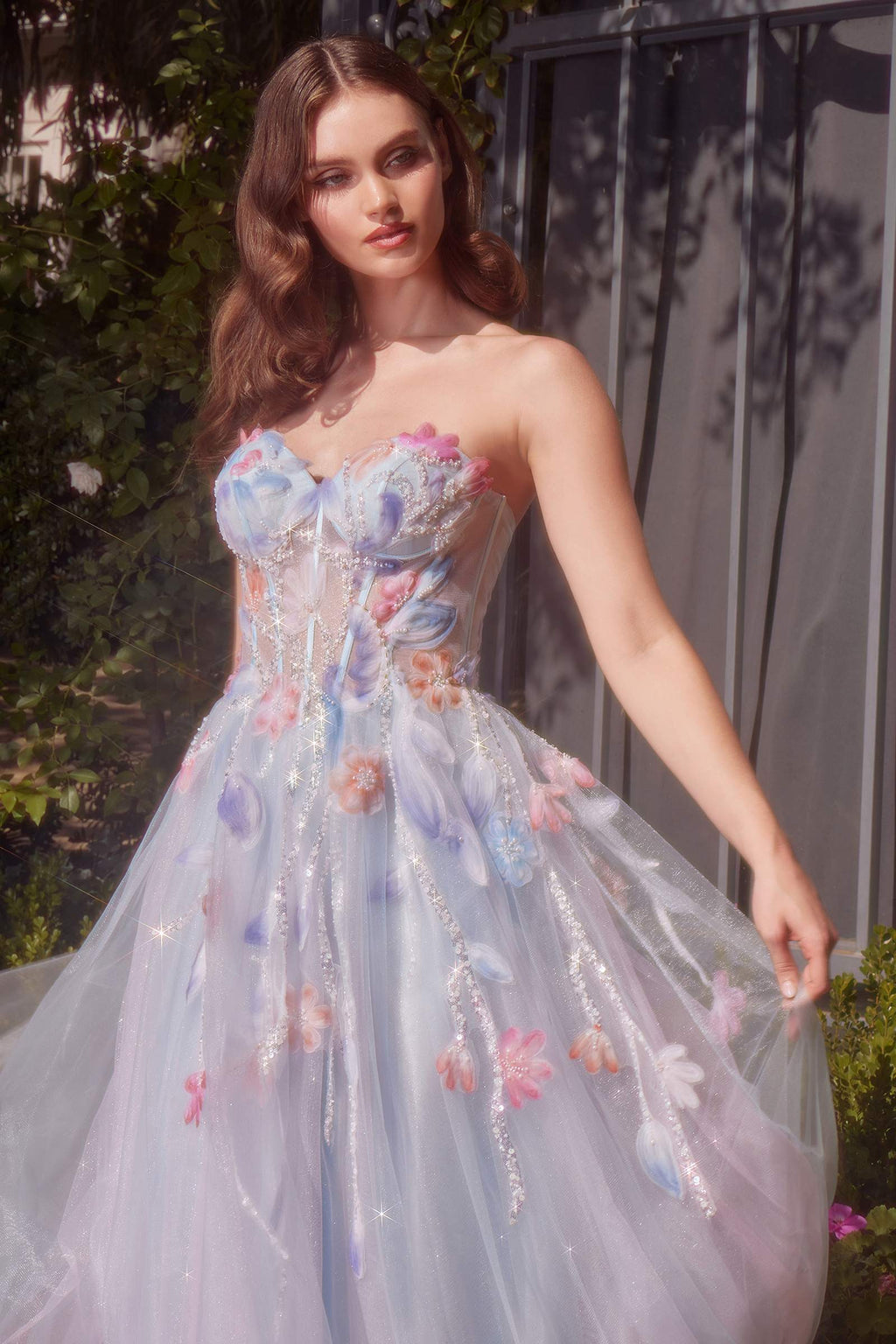 Light blue A-line strapless dress with sweetheart bodice, pastel floral embroidery, sparkly details