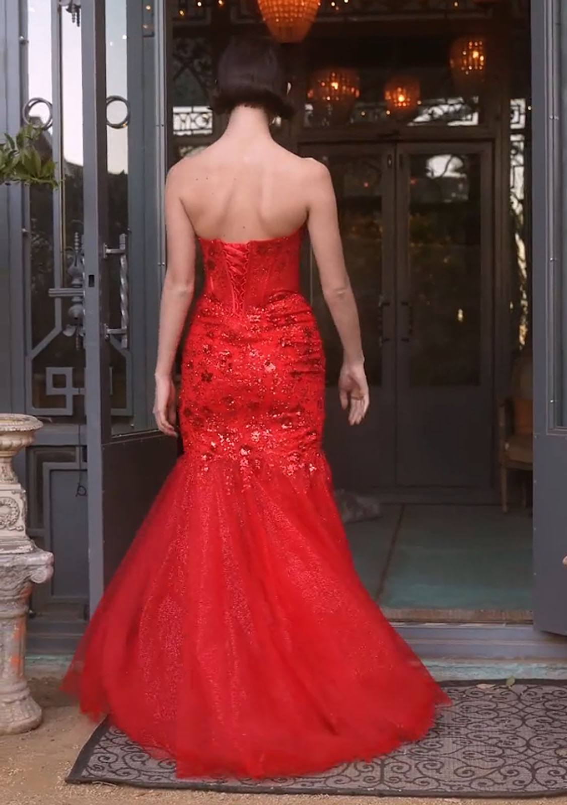 Red backless sequin mermaid gown with lace-up-style back and long train
