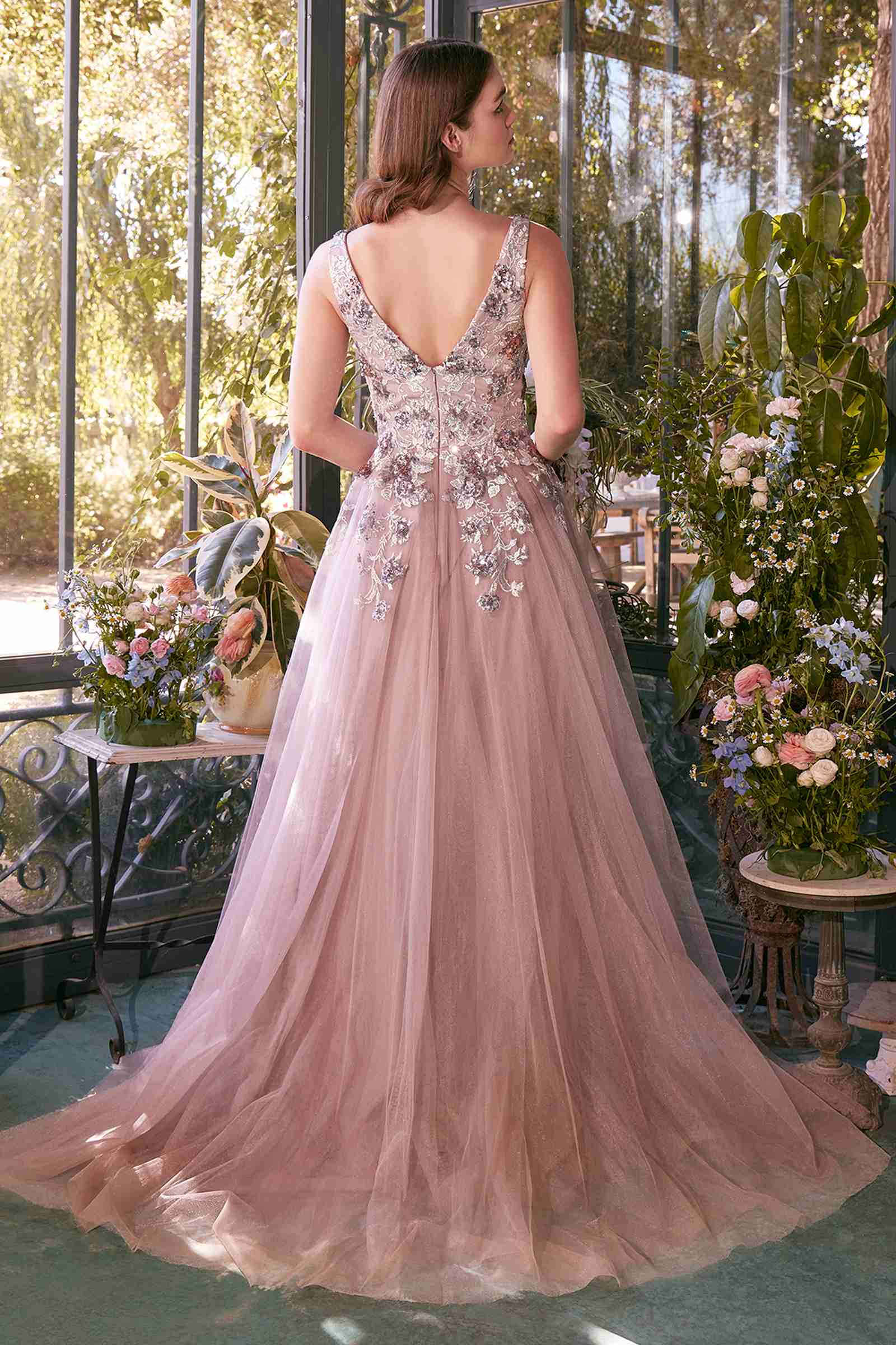 Dusty mauve sequin sleeveless gown with V-back, floral bodice appliqué, and full tulle skirt