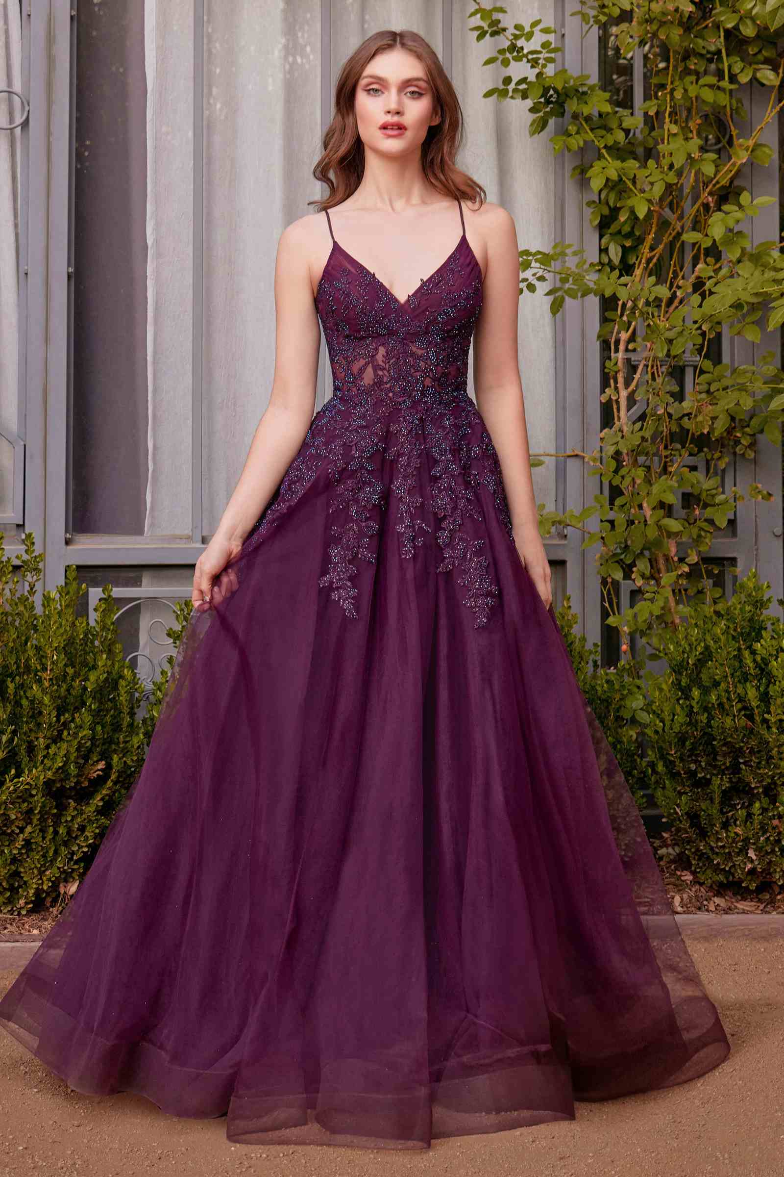 Burgundy A-line lace and tulle gown with lace appliques and spaghetti straps