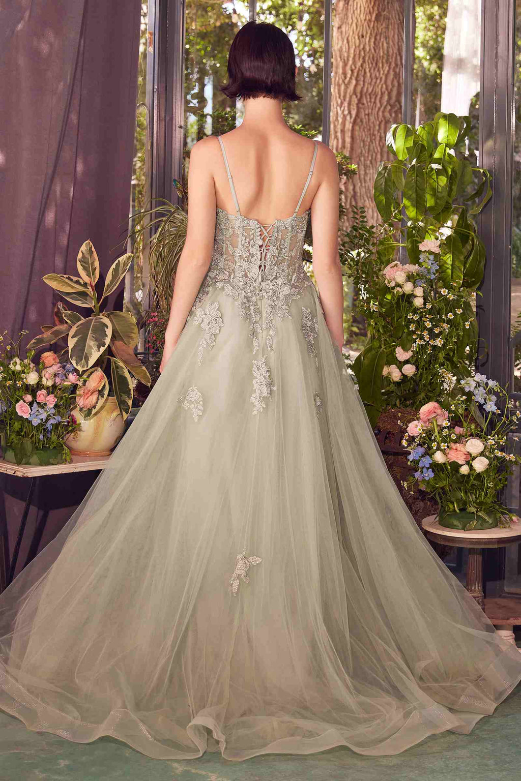 Sage green A-line lace appliqued tulle gown from back, with lace detail