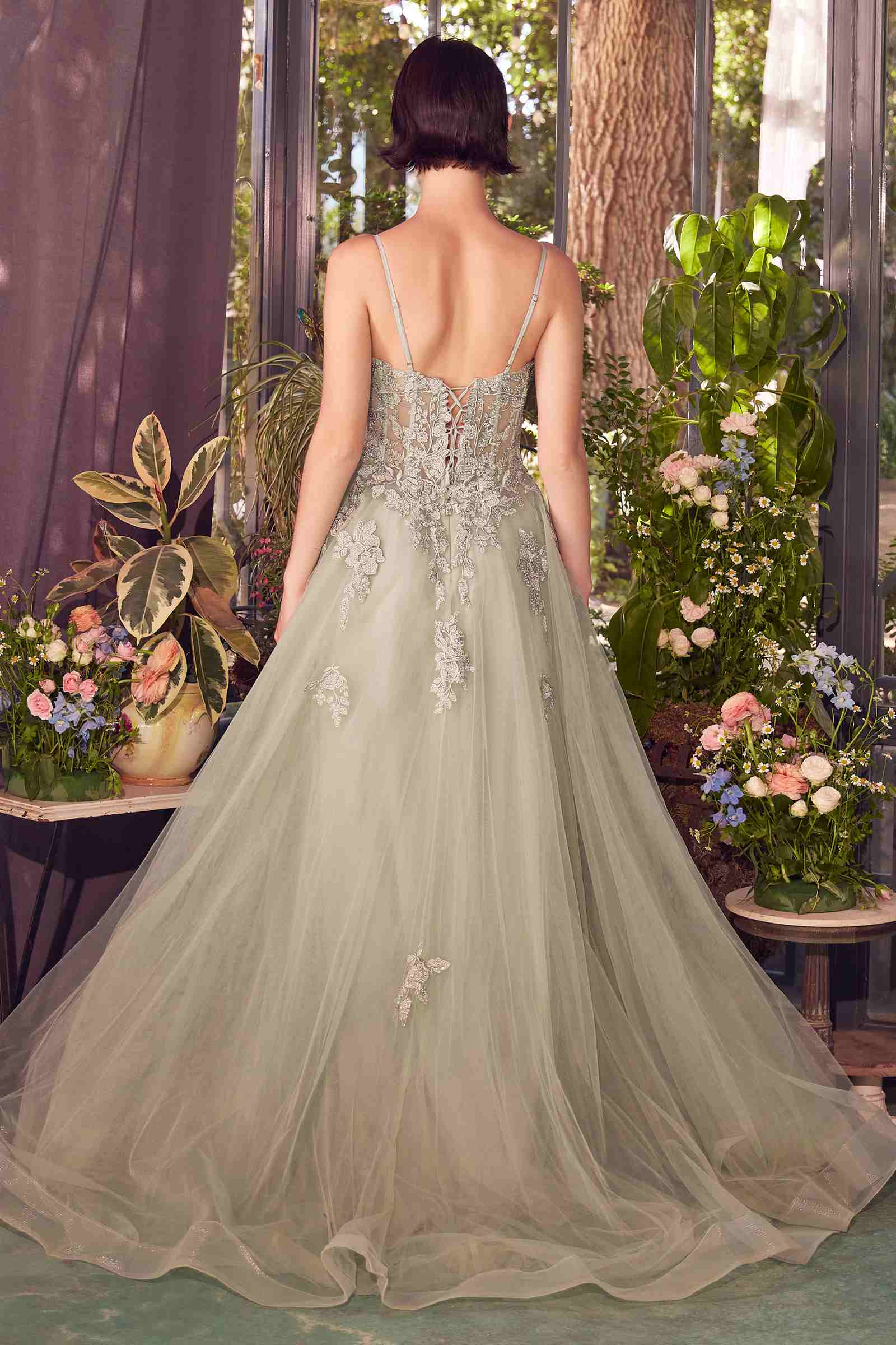Sage green A-line lace appliqued tulle gown from back, with lace detail
