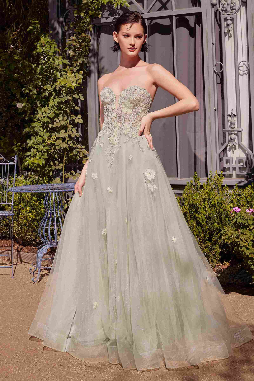 Sage green strapless A-line ball gown with lace bodice and tulle skirt