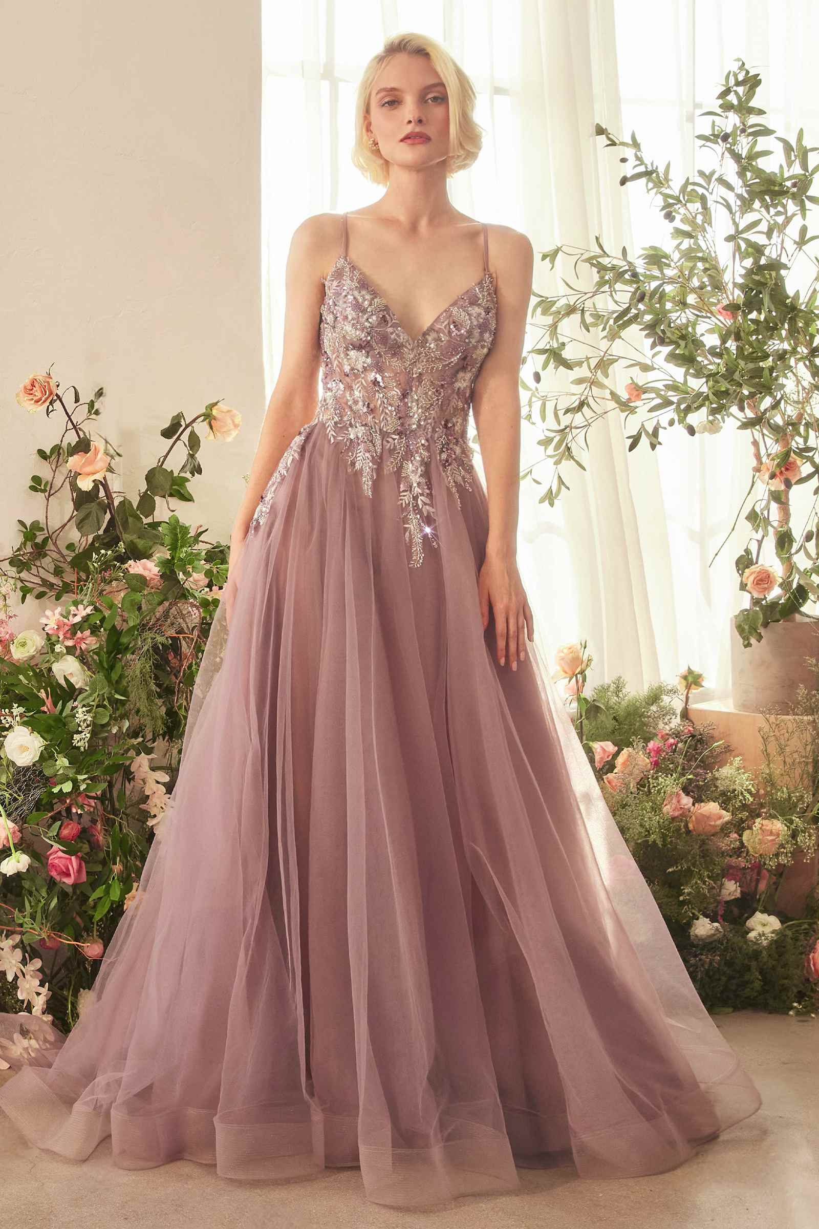Purple A-line tulle gown with lace bodice, spaghetti straps, and layered skirt