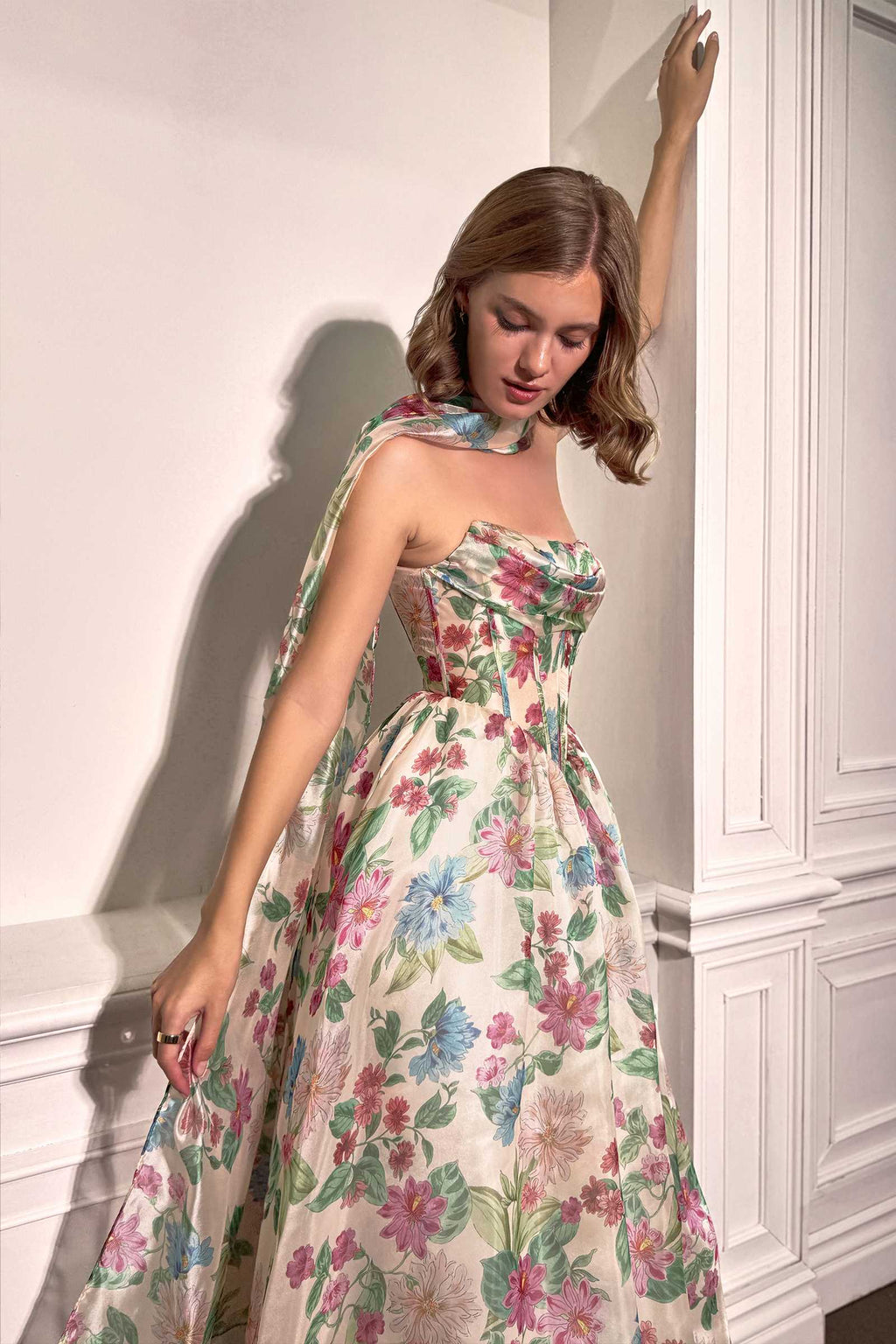 Strapless floral A-line corset gown with sweetheart neckline and corset lace-up back
