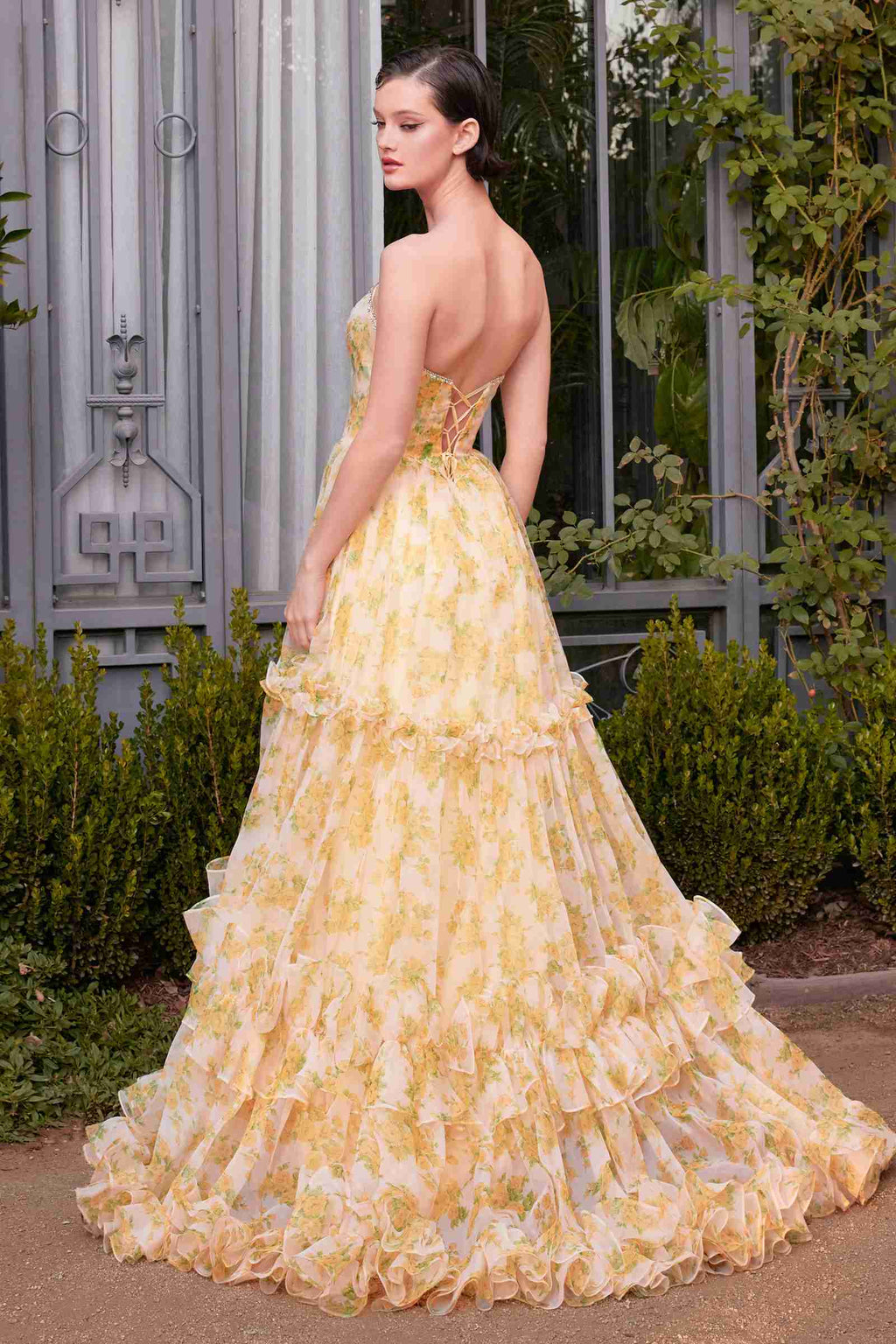 Yellow strapless floral ball gown with sweetheart bodice and tiered ruffle skirt