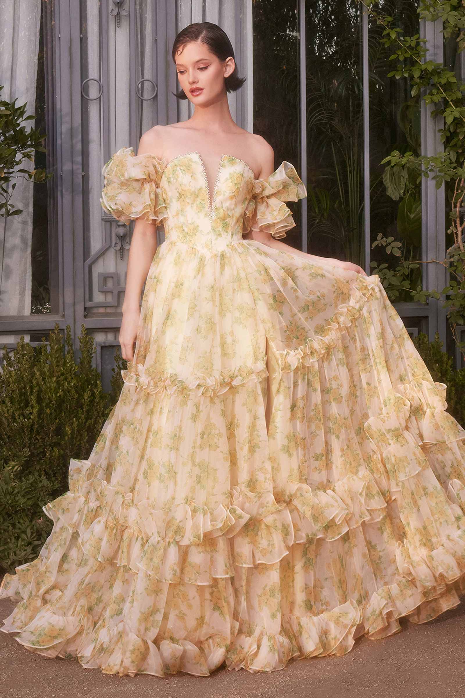 Yellow strapless floral ball gown with puff sleeves and cascading tiered ruffles