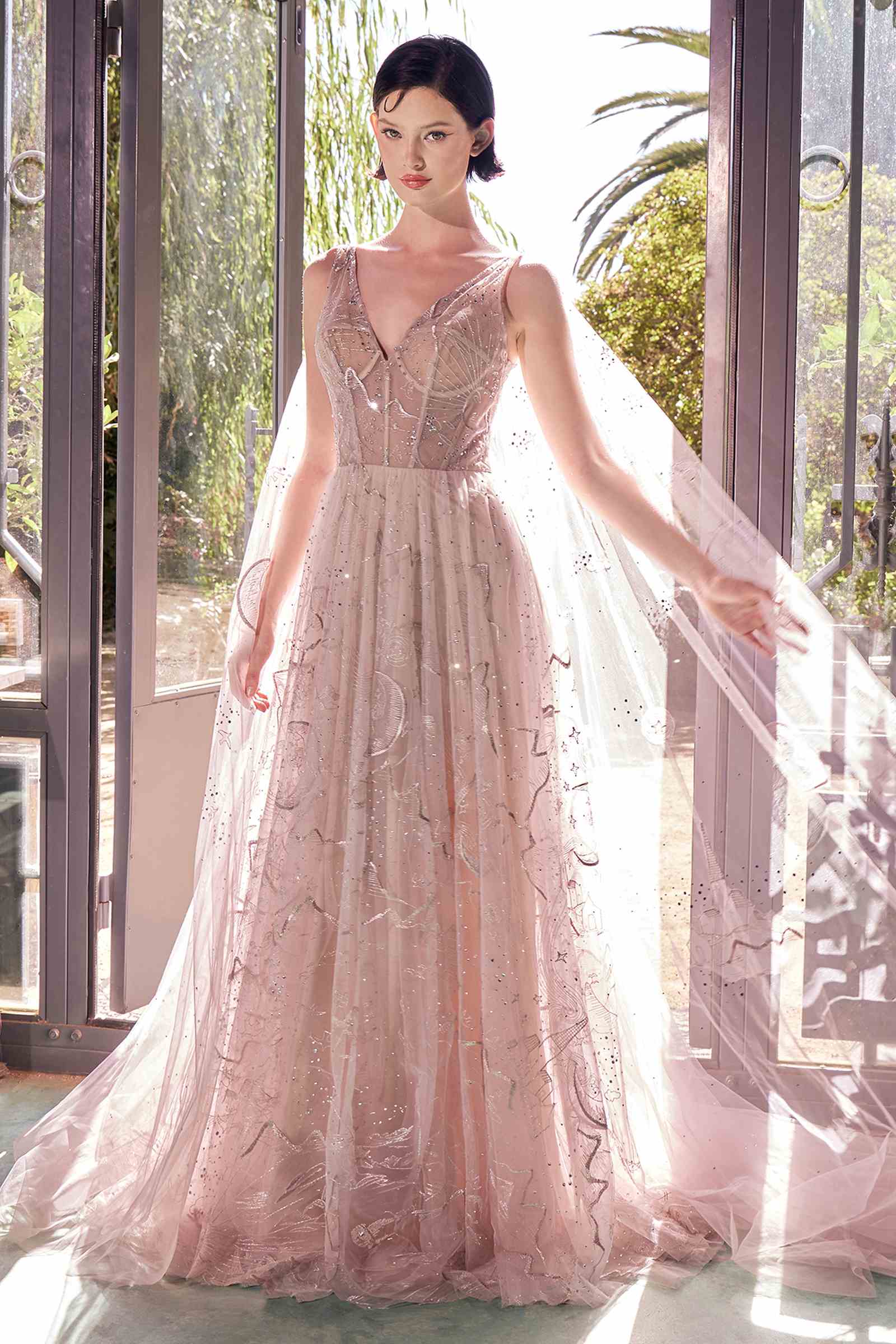 Nude sleeveless embroidered tulle ballgown with sheer flowing cape