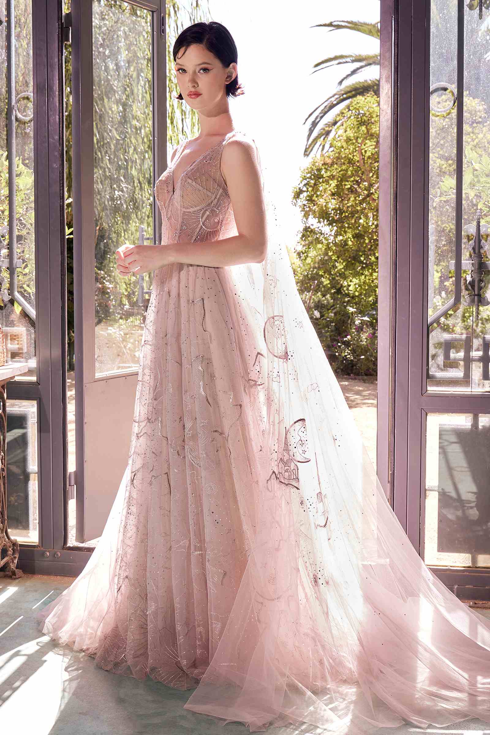 Nude sleeveless embroidered tulle ballgown with fitted bodice and full skirt
