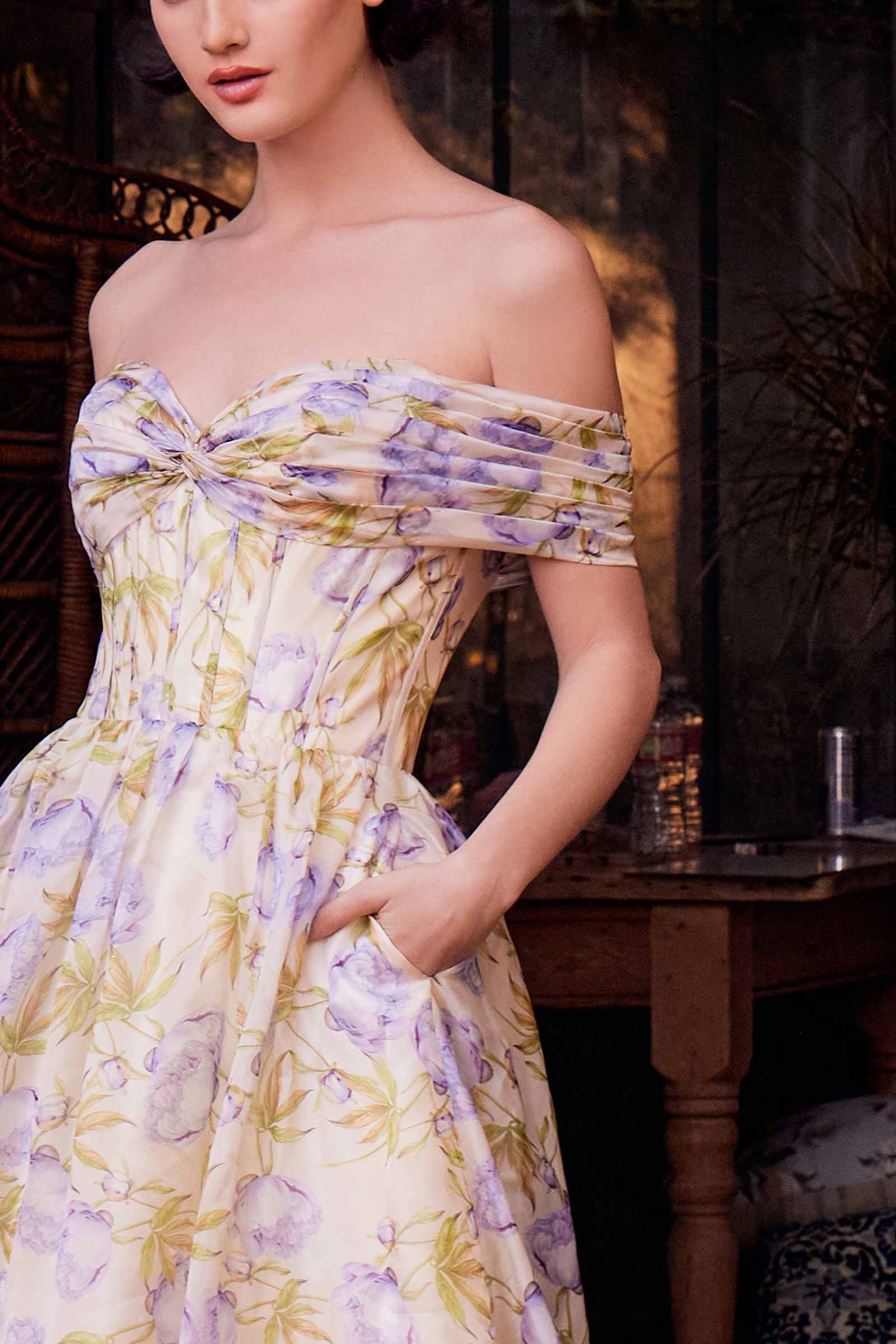 Yellow floral off-shoulder A-line maxi dress with bow-tie neckline, close-up