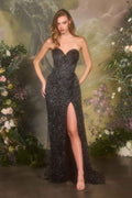 Black strapless sweetheart fitted formal gown with sparkling texture and front leg slit