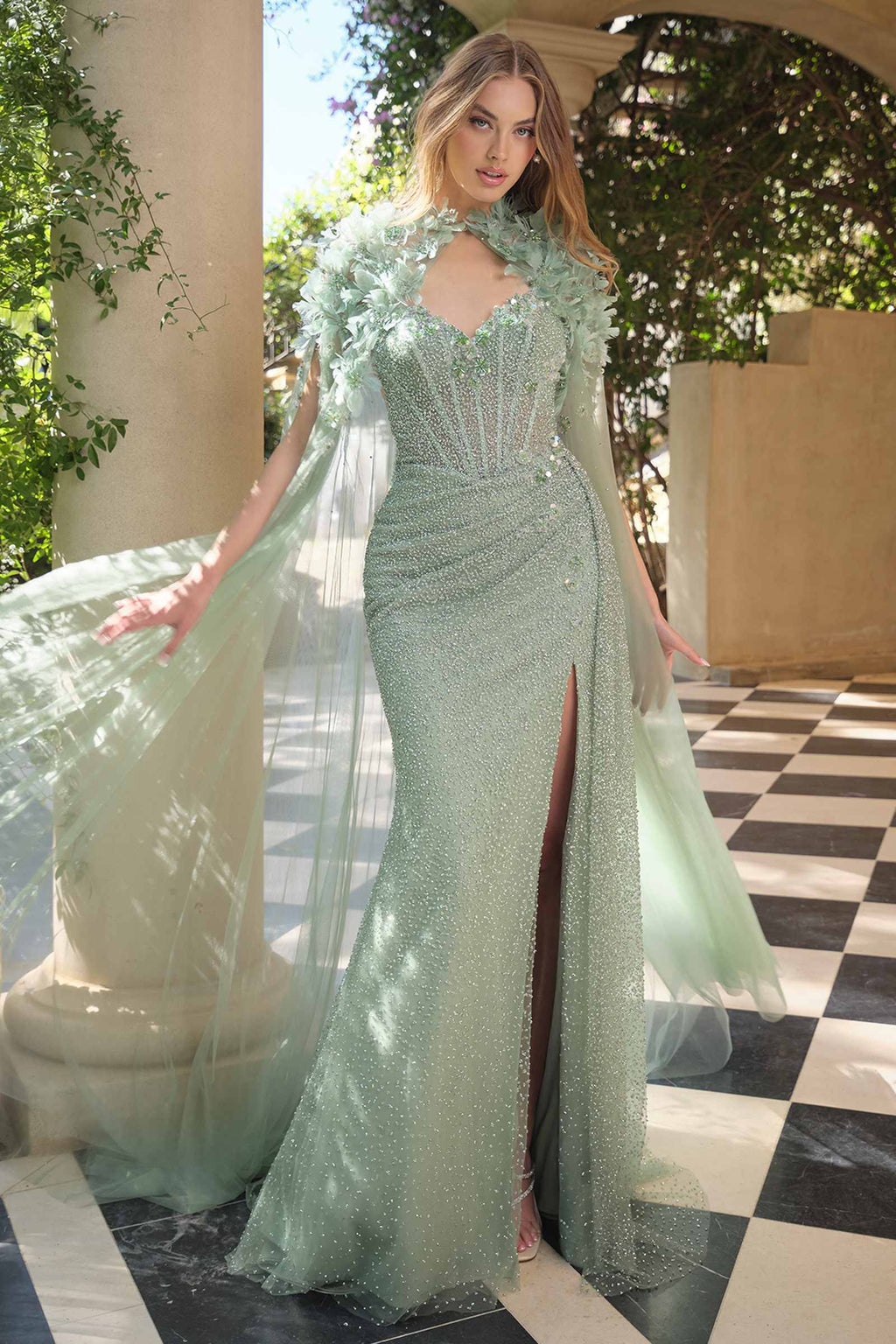 Sage green strapless sweetheart fitted gown with ornate beaded bodice and flowing slit skirt
