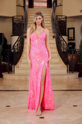 Hot pink fully sequined sleeveless V-neck gown with a long front slit.