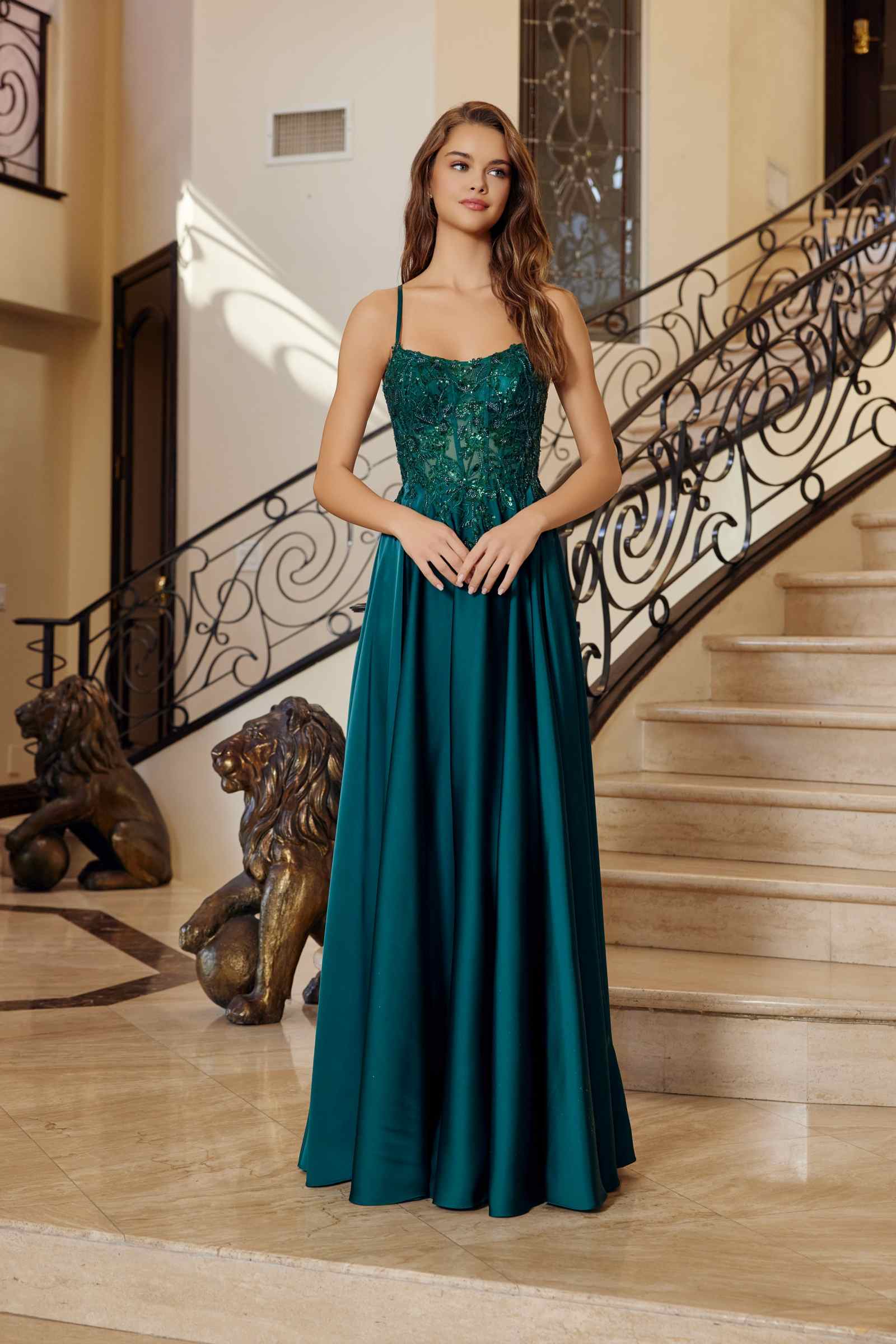 Emerald satin A-line dress with thin straps and ruched textured bodice