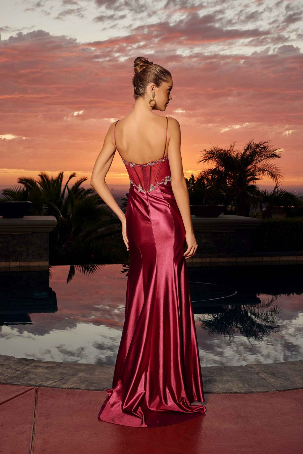 Wine fitted satin evening gown, open-back with jeweled straps and long slit