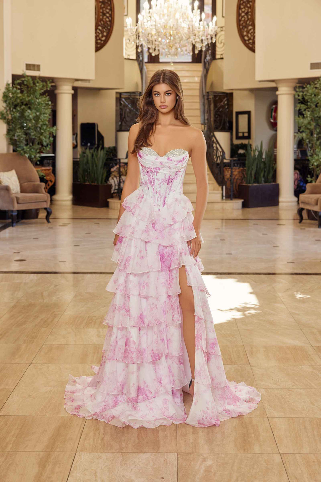 Pink printed strapless chiffon prom gown with layered ruffled tiers and slit